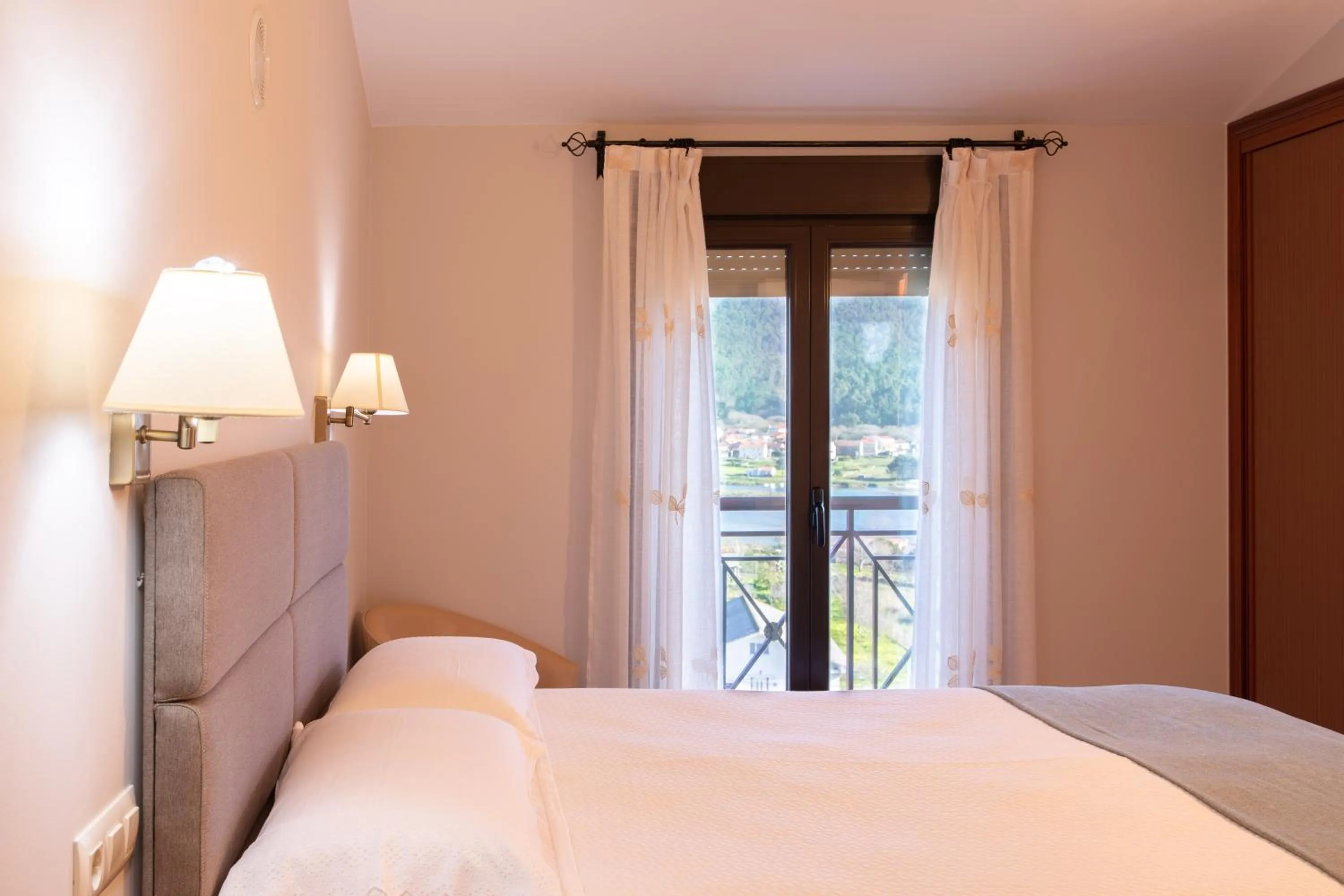 Bed in Apartamentos Rurales de Abelleira