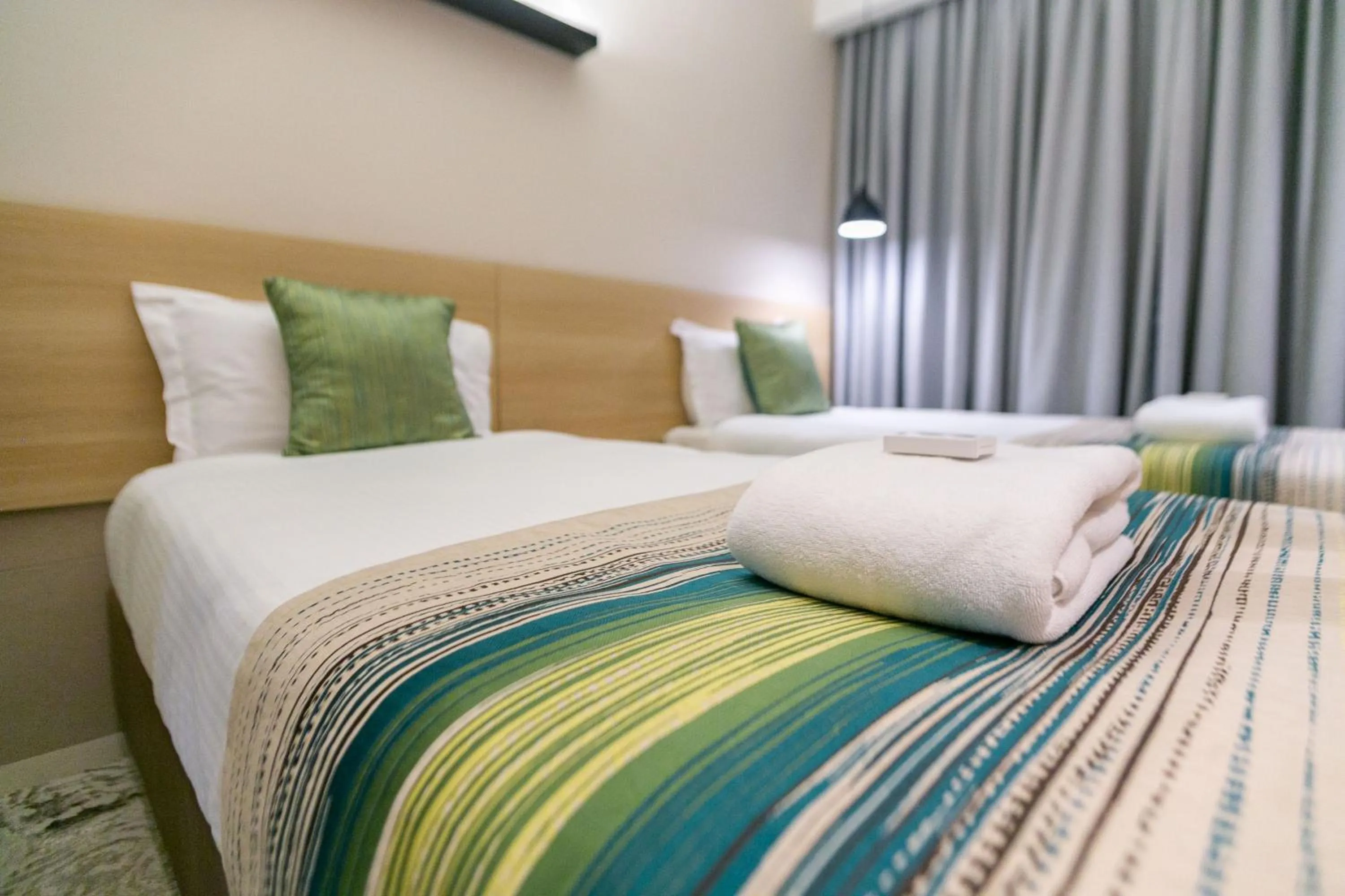 Photo of the whole room, Bed in Kozi Suites Nairobi Airport