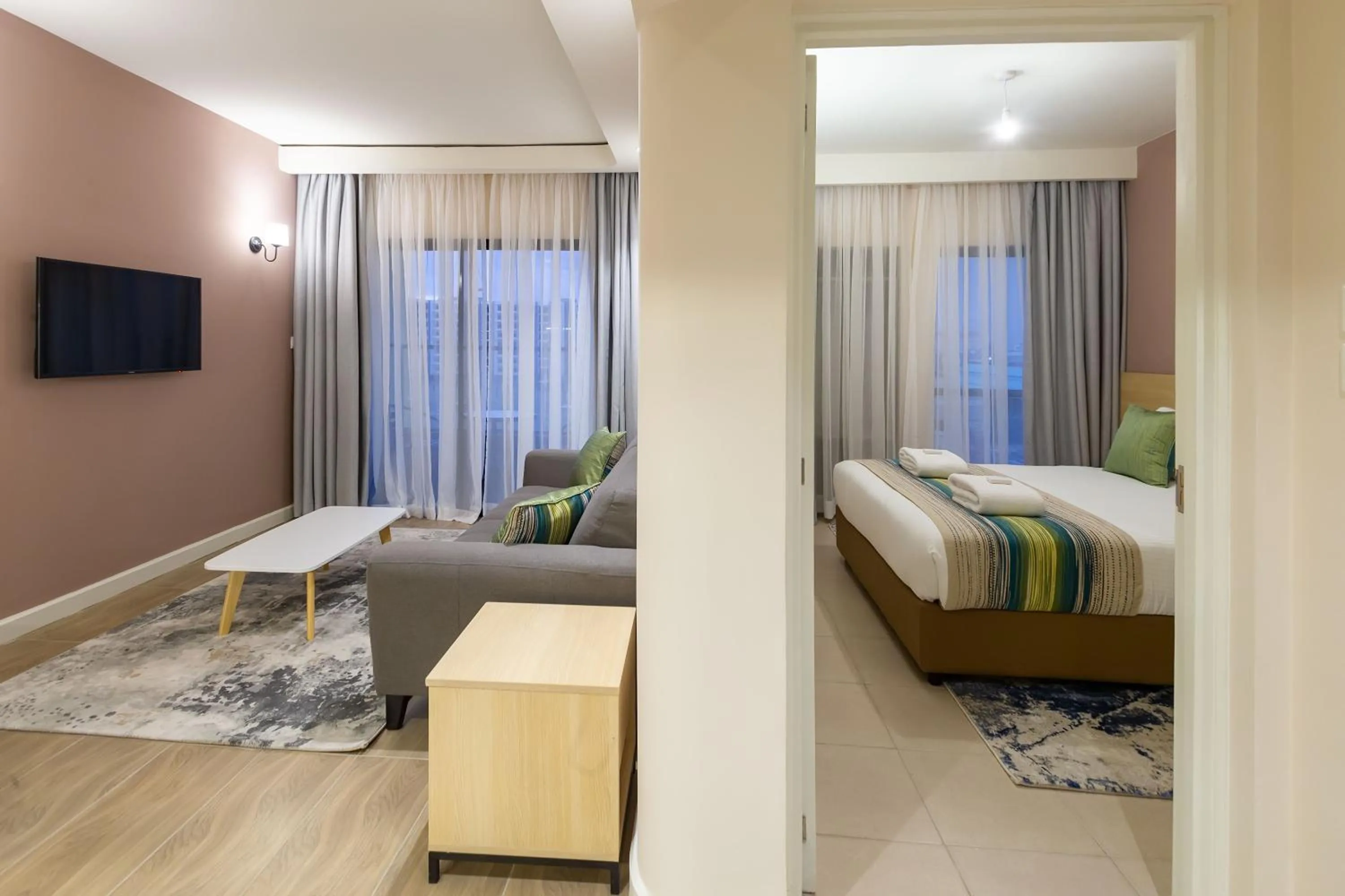 Photo of the whole room, Bed in Kozi Suites Nairobi Airport