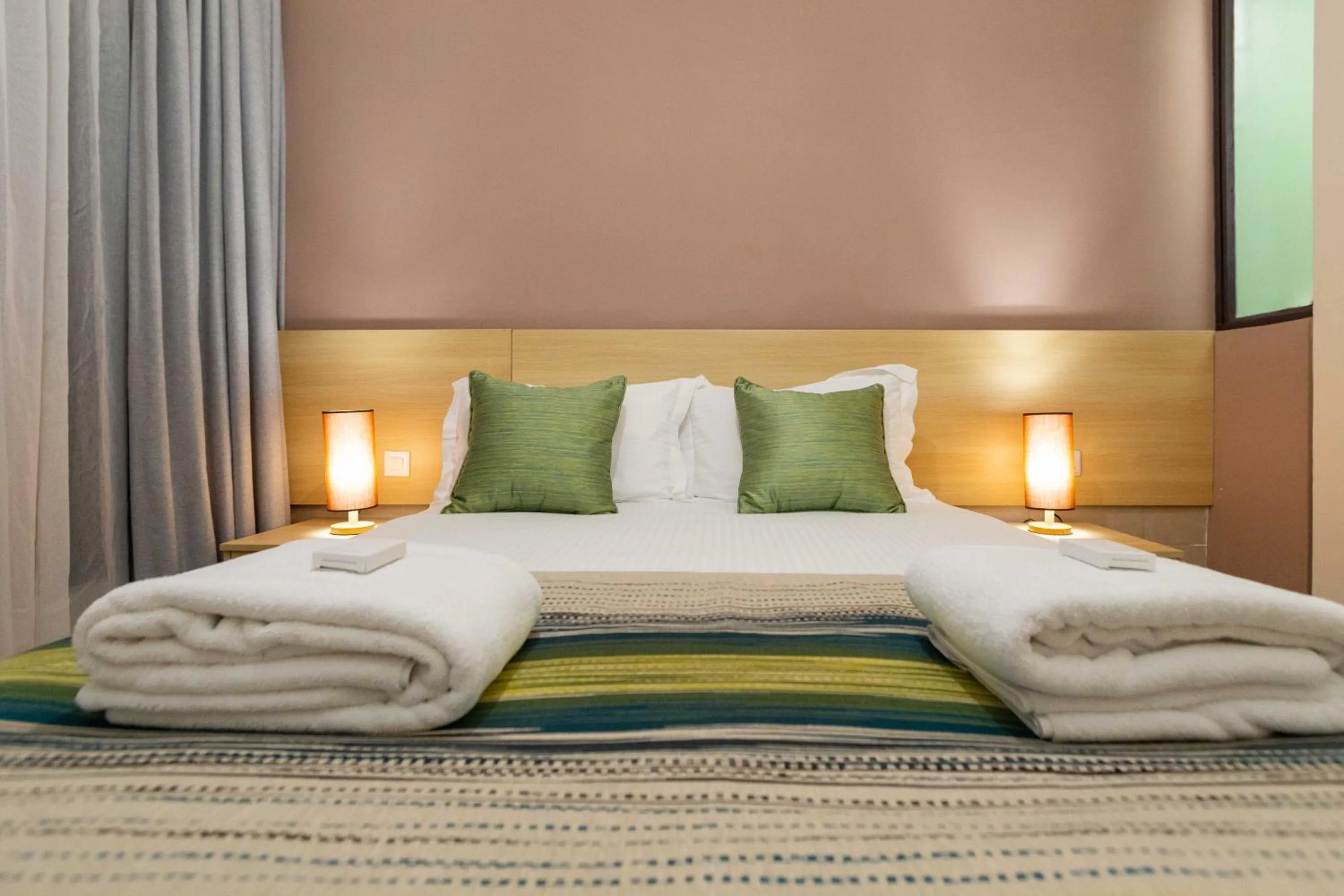 Photo of the whole room, Bed in Kozi Suites Nairobi Airport