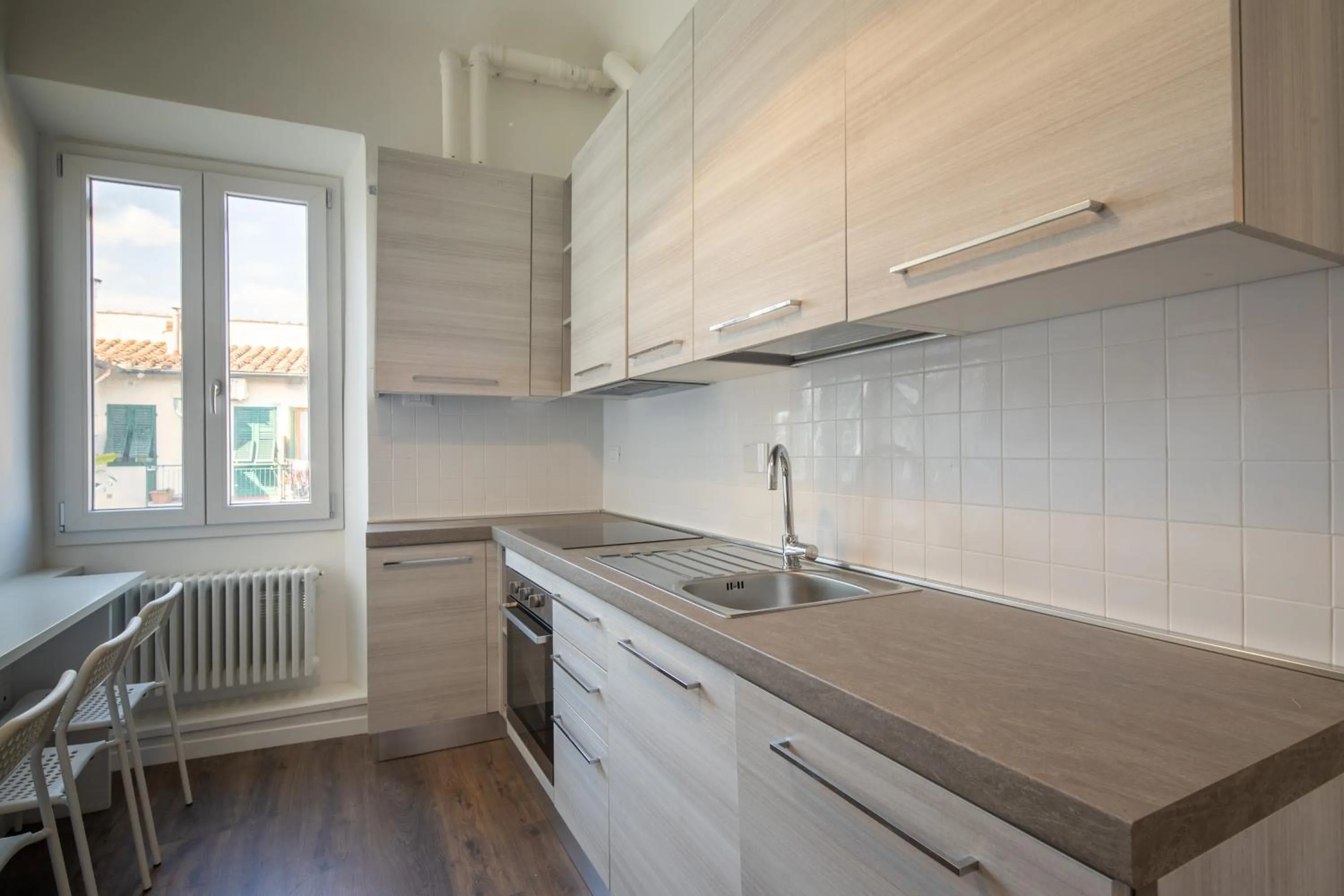 Kitchen or kitchenette in Indipendenza House by Mmega