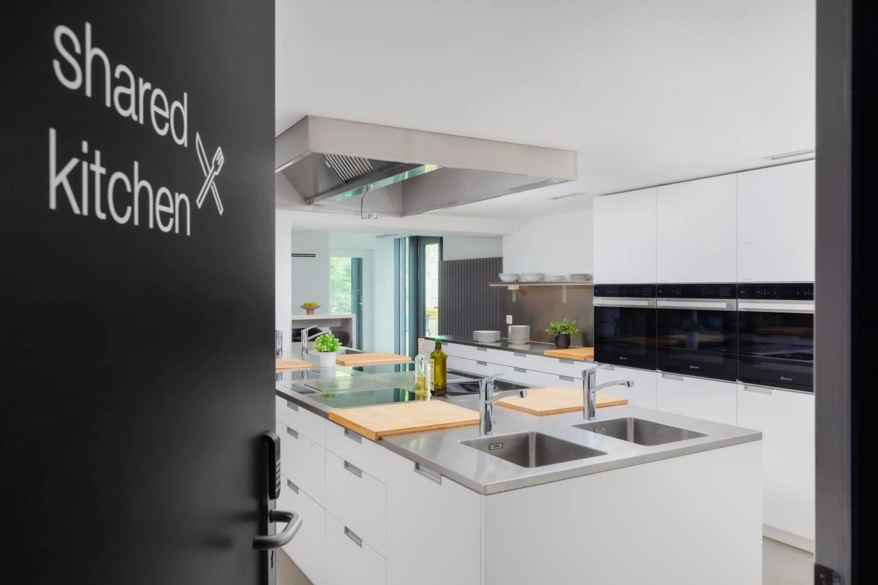 Kitchen or kitchenette in VISIONAPARTMENTS Basel - contactless check-in