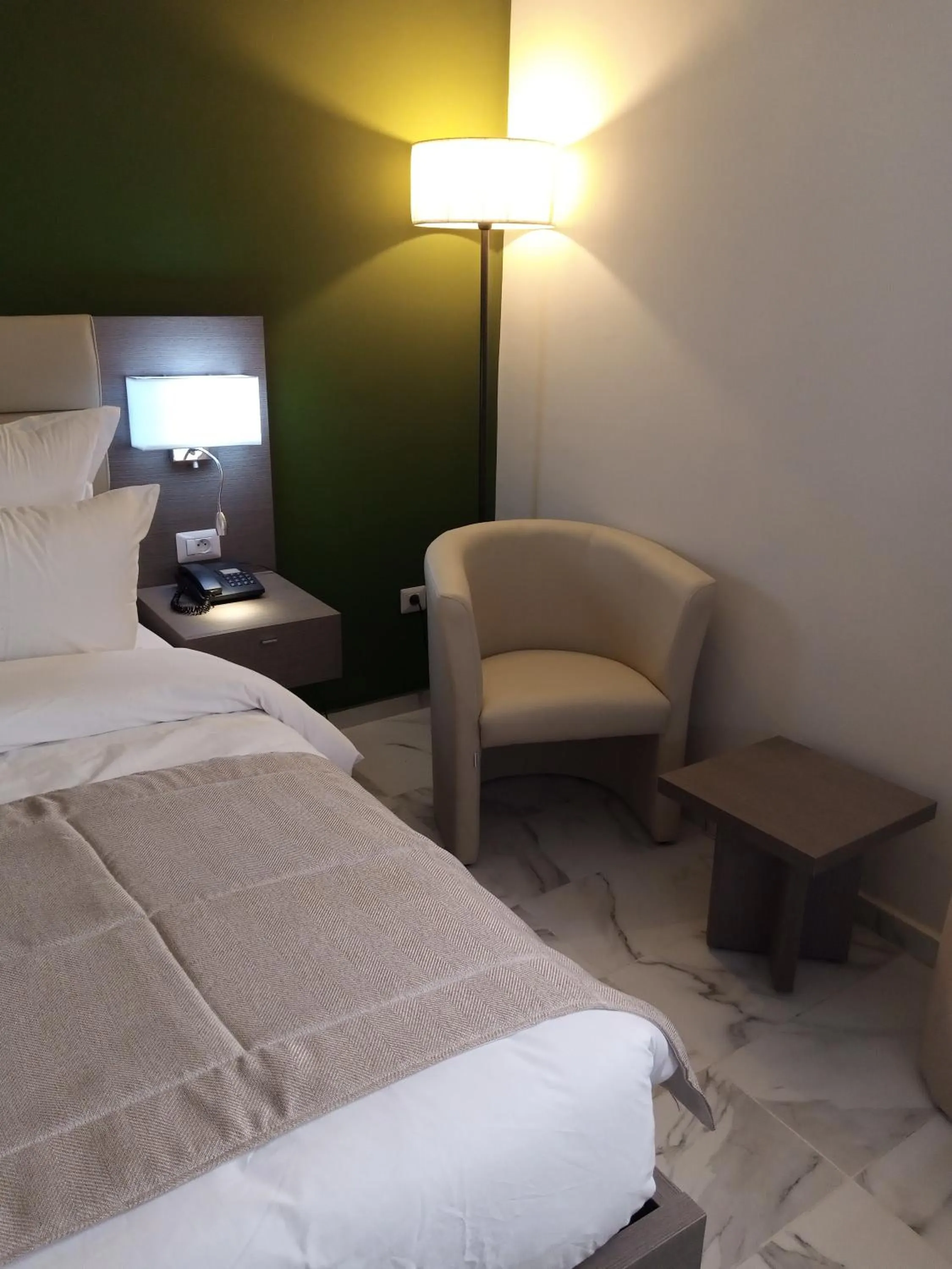 View (from property/room), Bed in MERINA HOTEL