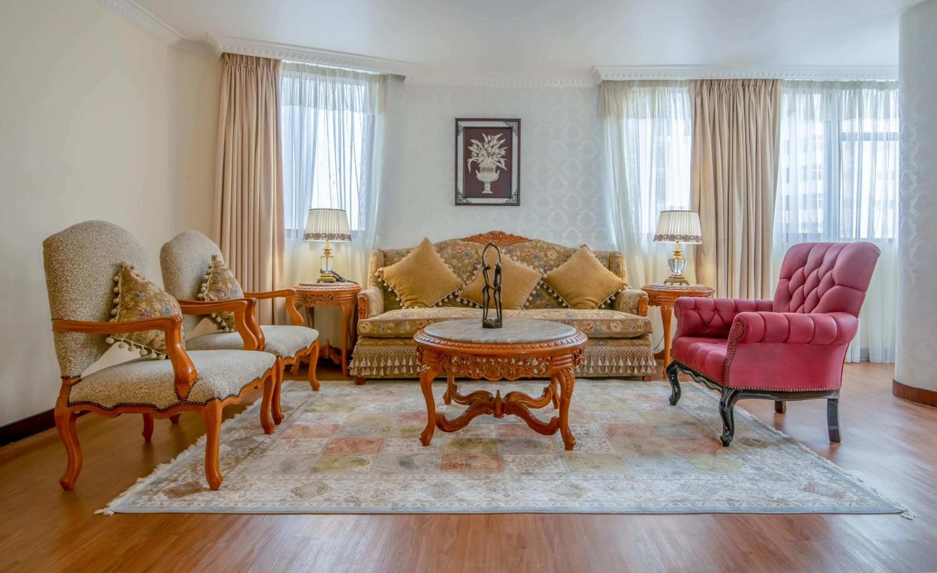Living room in The Grand Palace Hotel