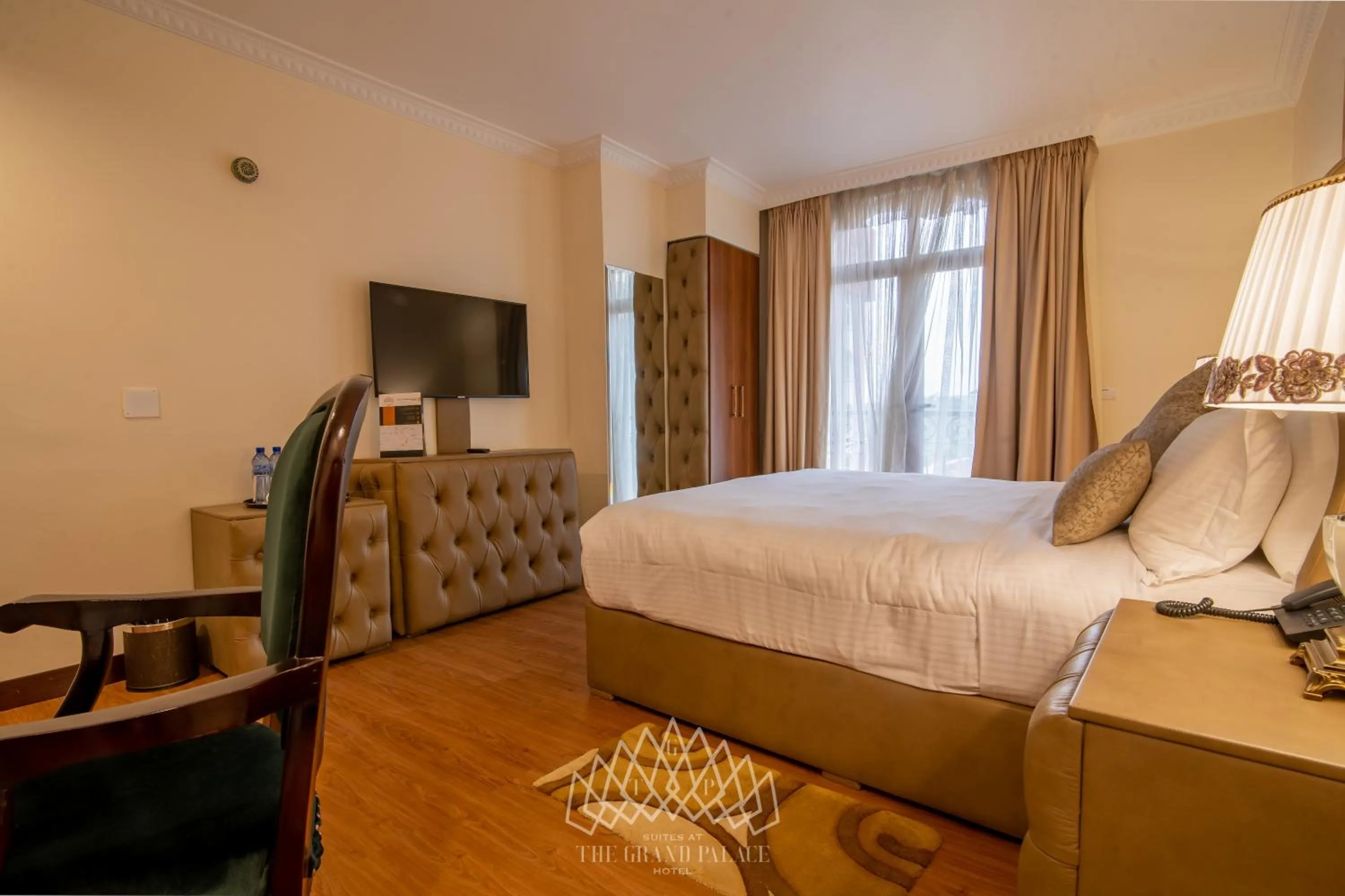 Photo of the whole room, Bed in The Grand Palace Hotel