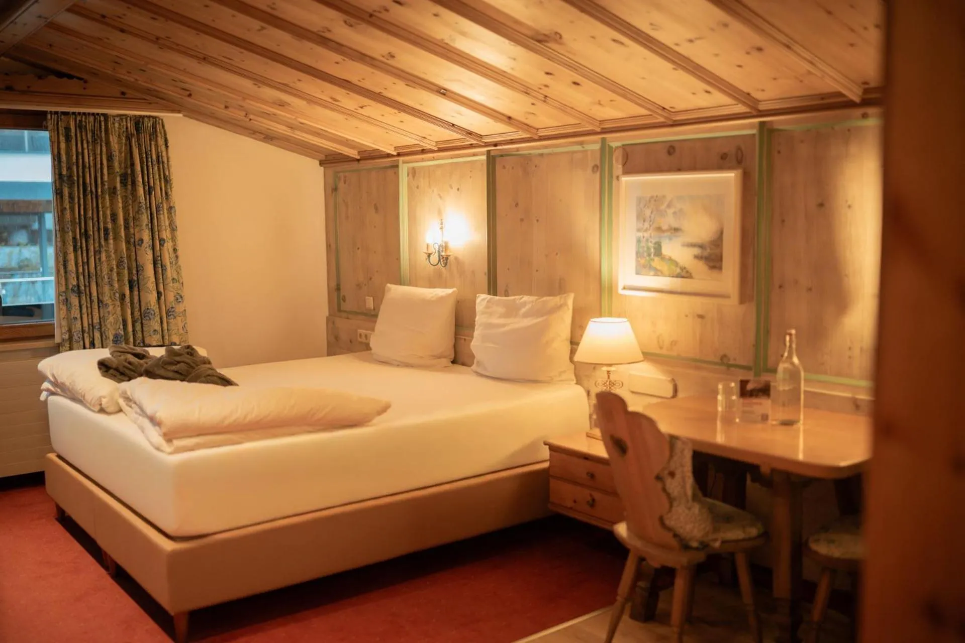 Photo of the whole room, Bed in Hotel Tirolerhof - Familotel Zugspitze