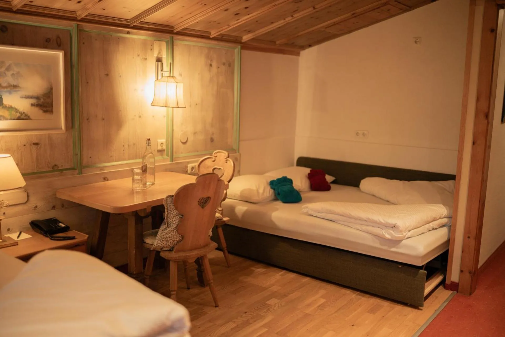 Photo of the whole room, Bed in Hotel Tirolerhof - Familotel Zugspitze