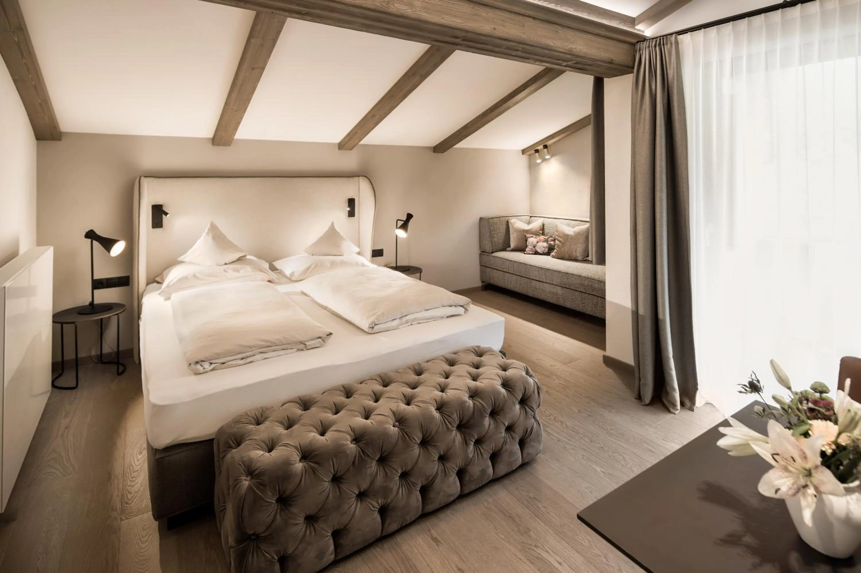 Photo of the whole room, Bed in Brugger's Genießerhotel Lanersbacherhof