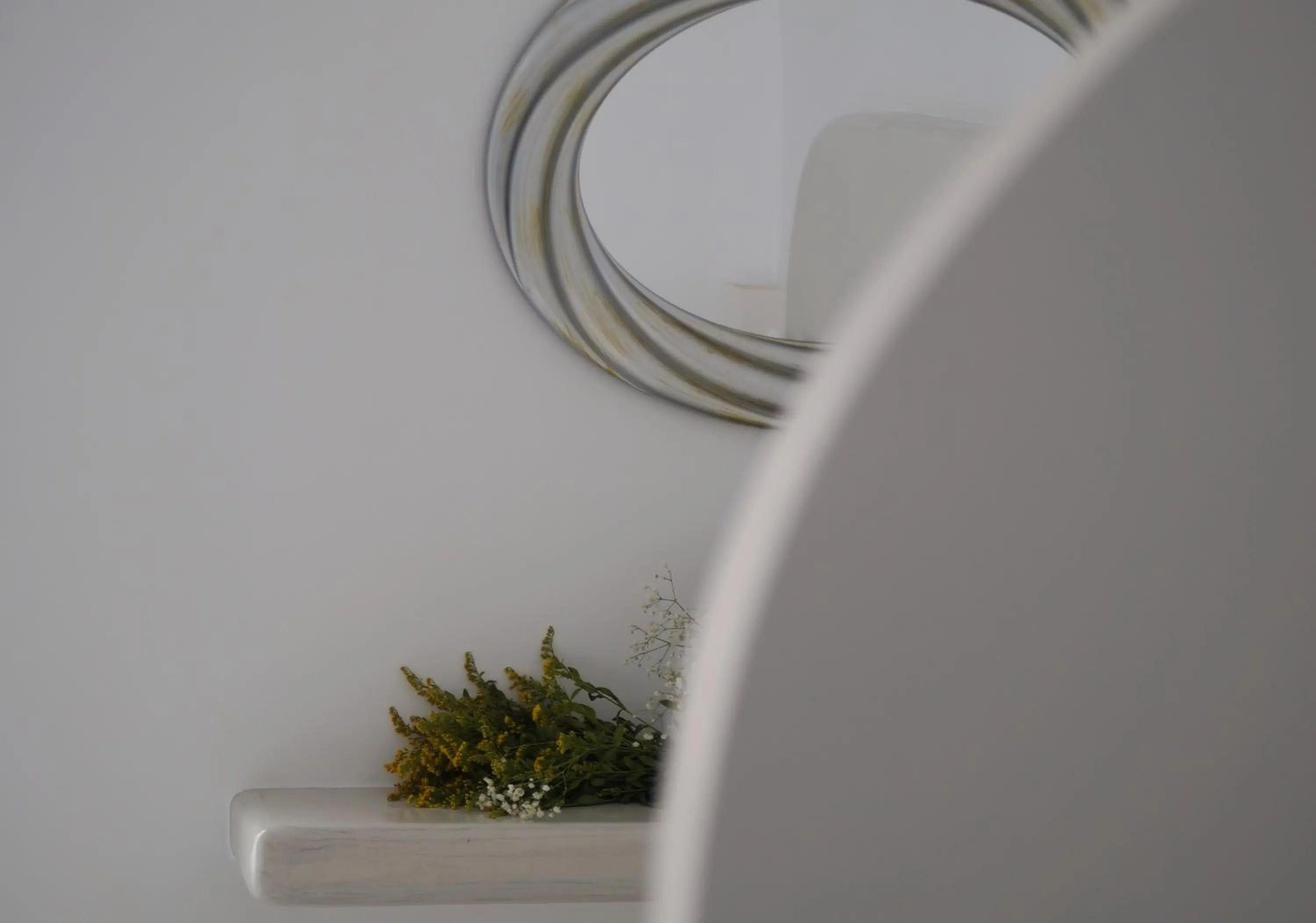 Bed in Golden Stone Santorini Suites