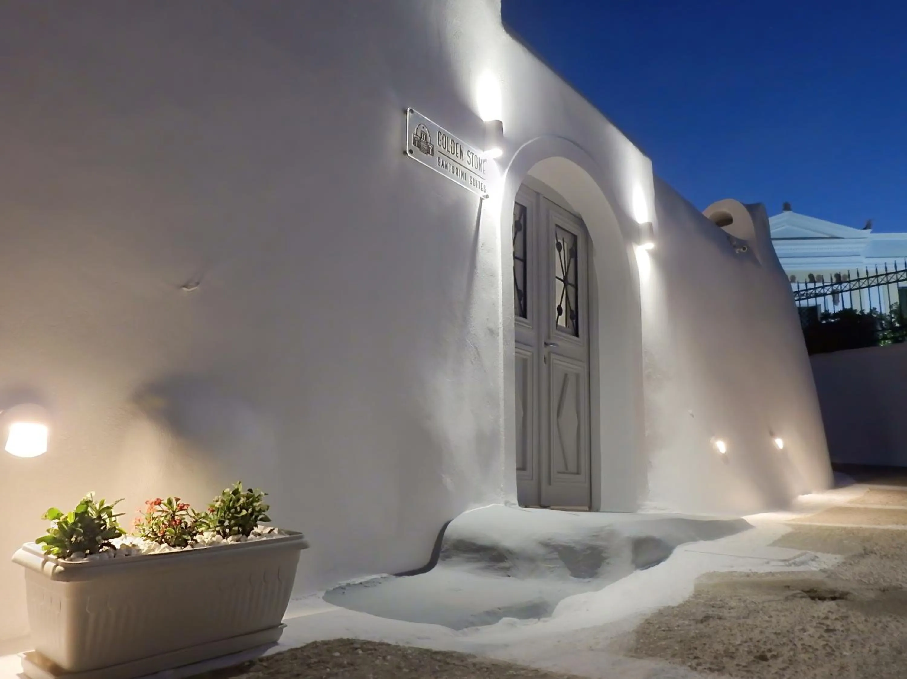 Facade/entrance in Golden Stone Santorini Suites