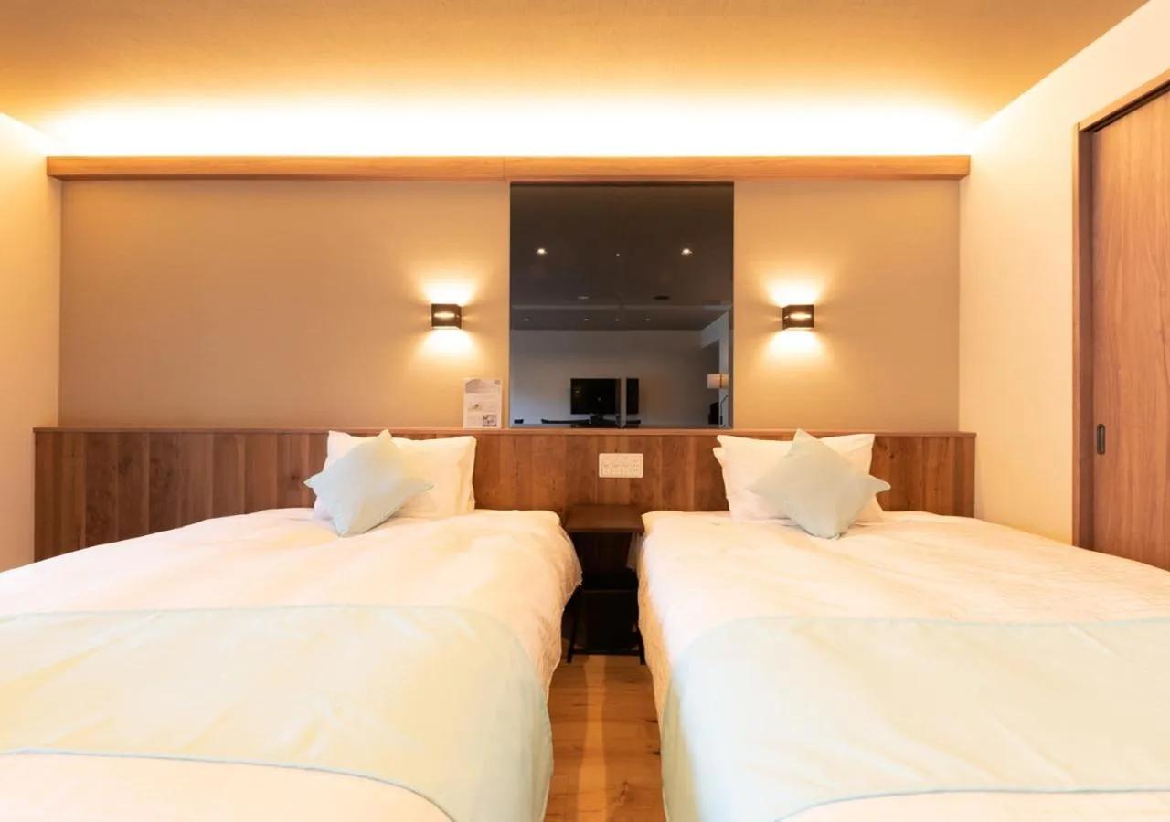Bed in LiVEMAX RESORT Atami OCEAN