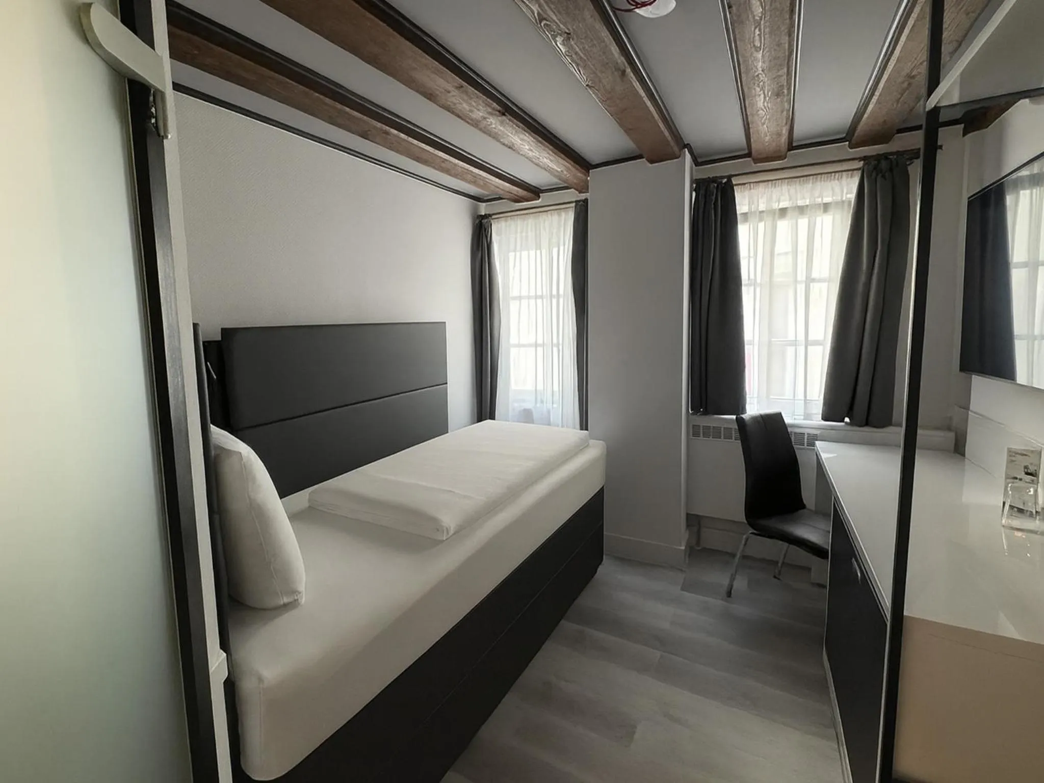 Photo of the whole room, Bed in DORMERO Hotel Schwäbisch Hall