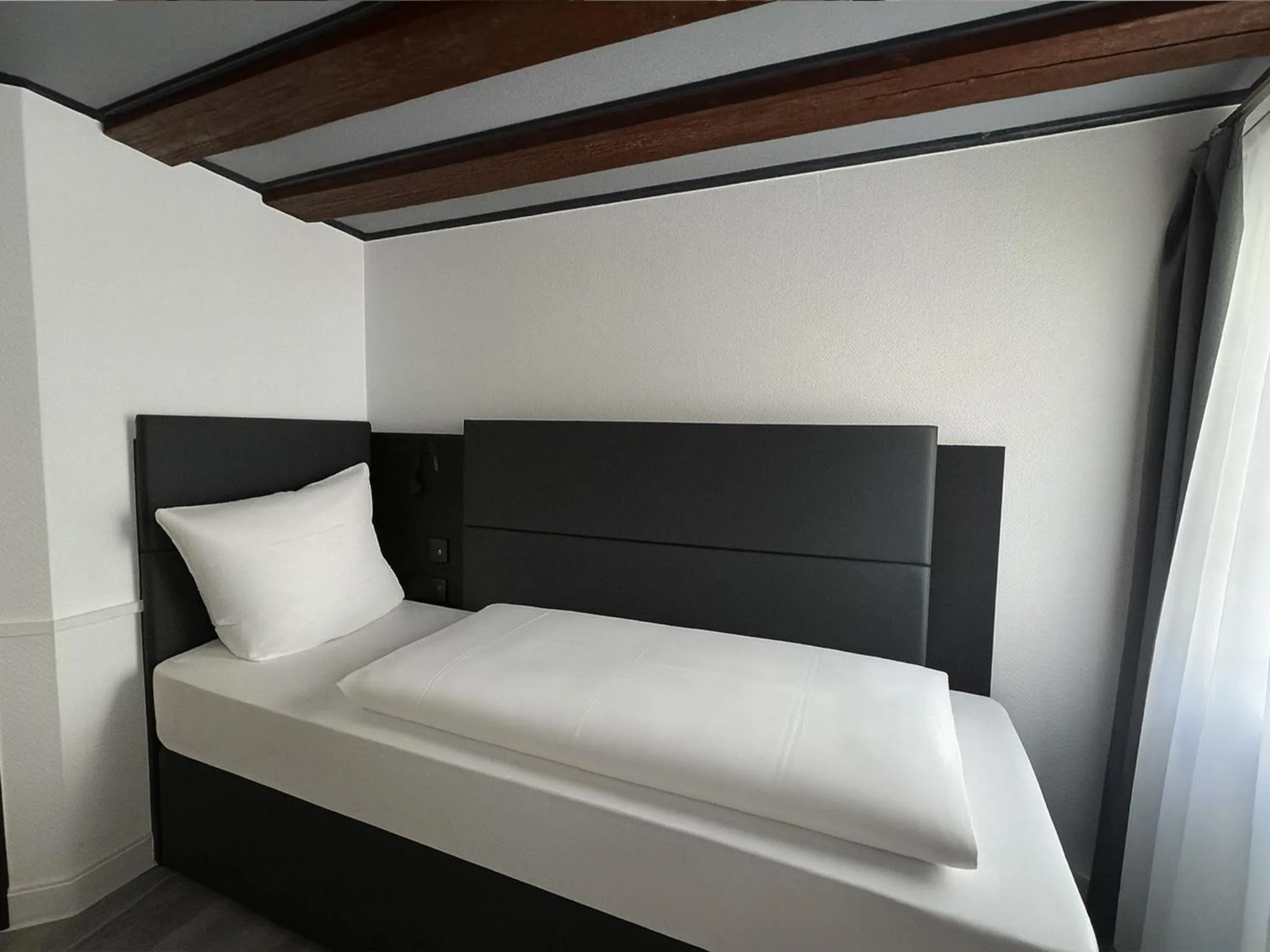 Photo of the whole room, Bed in DORMERO Hotel Schwäbisch Hall