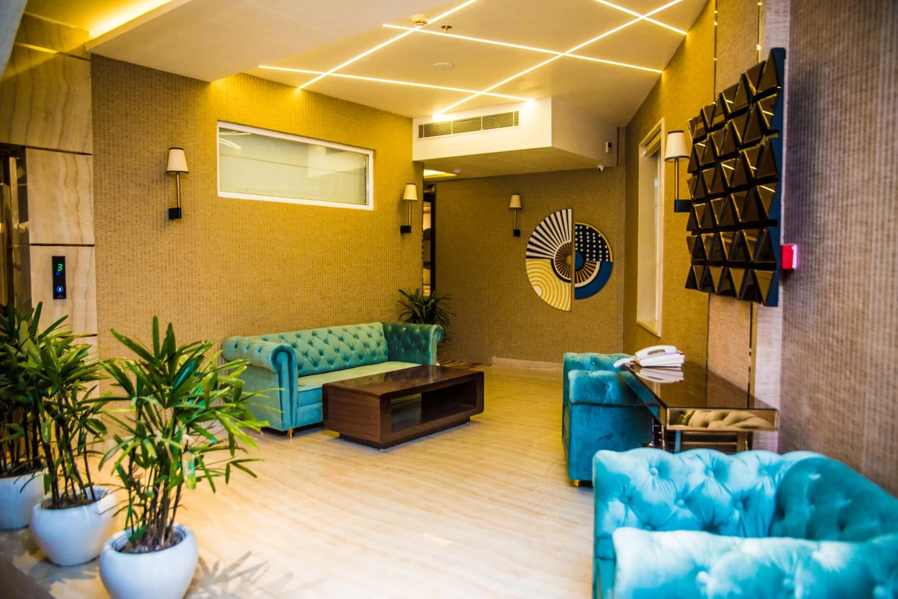 Seating area in Regenta Inn Amristar Airport Road by Royal Orchid Hotels Limited