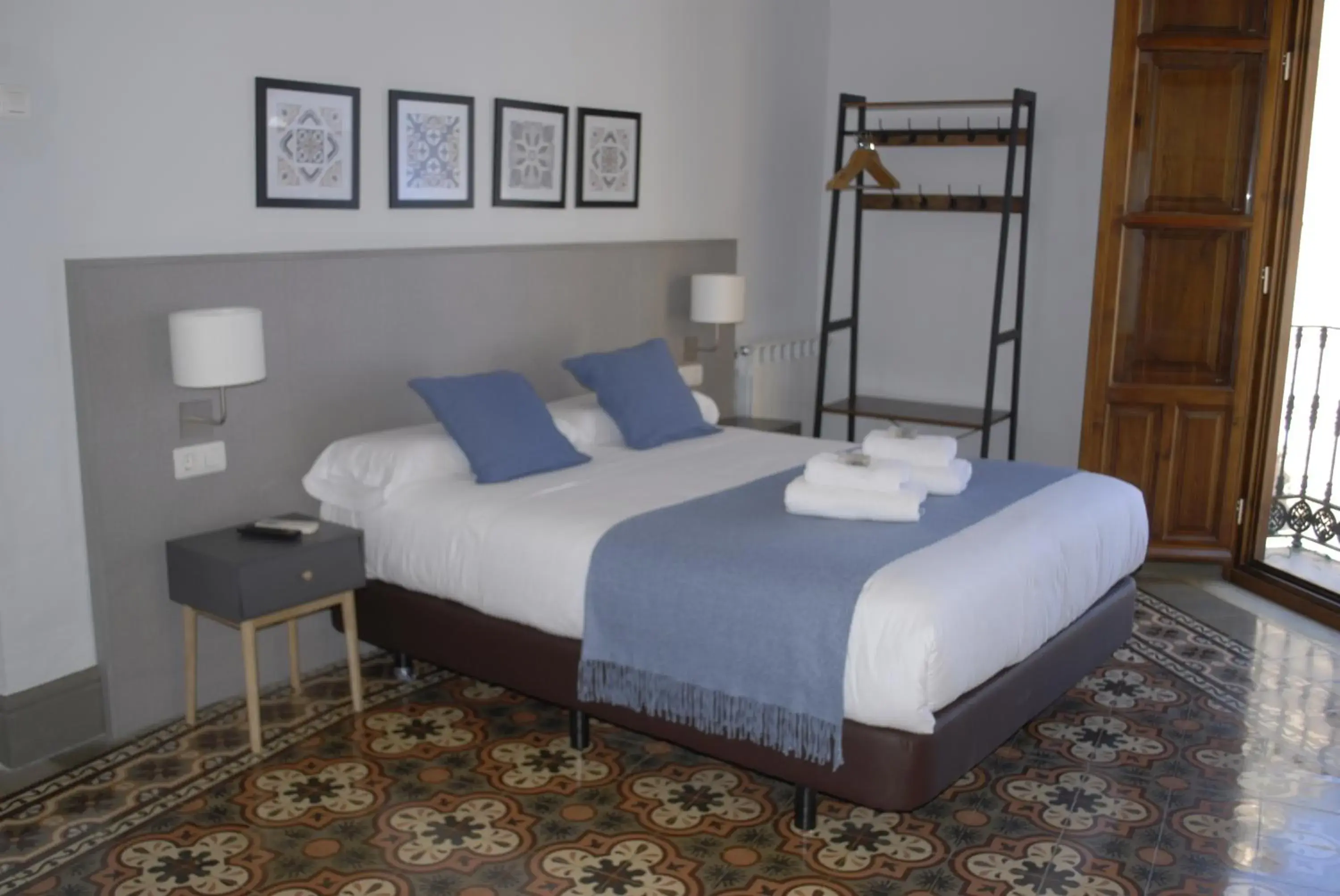Photo of the whole room, Bed in La Perla Granada Suites Photo of the whole room, Bed in La Perla Granada Suites