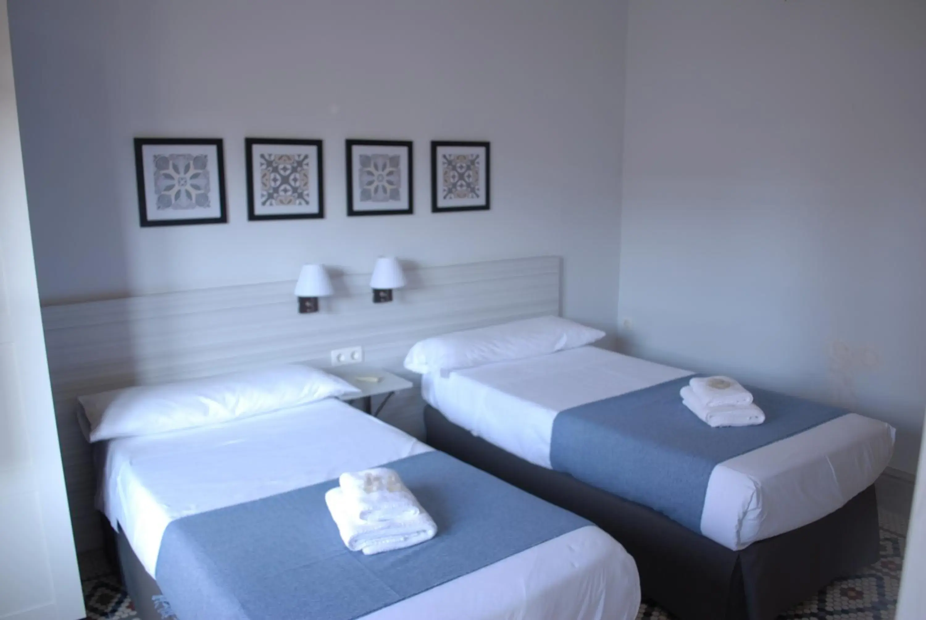 Photo of the whole room, Bed in La Perla Granada Suites Photo of the whole room, Bed in La Perla Granada Suites