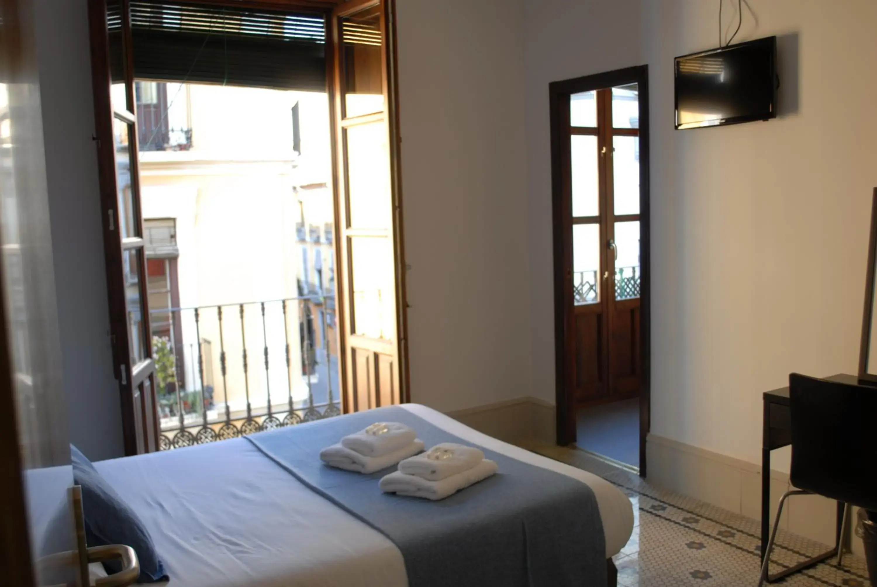 Photo of the whole room, Bed in La Perla Granada Suites Photo of the whole room, Bed in La Perla Granada Suites