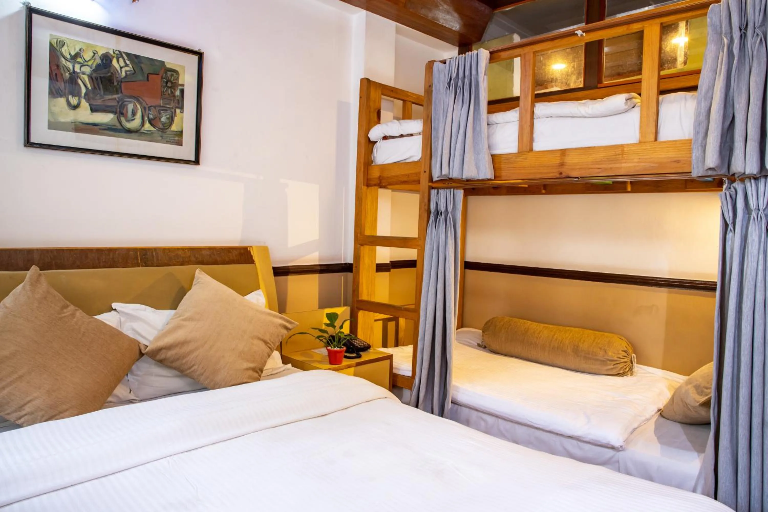 Bed in Shangrila Boutique Hotel