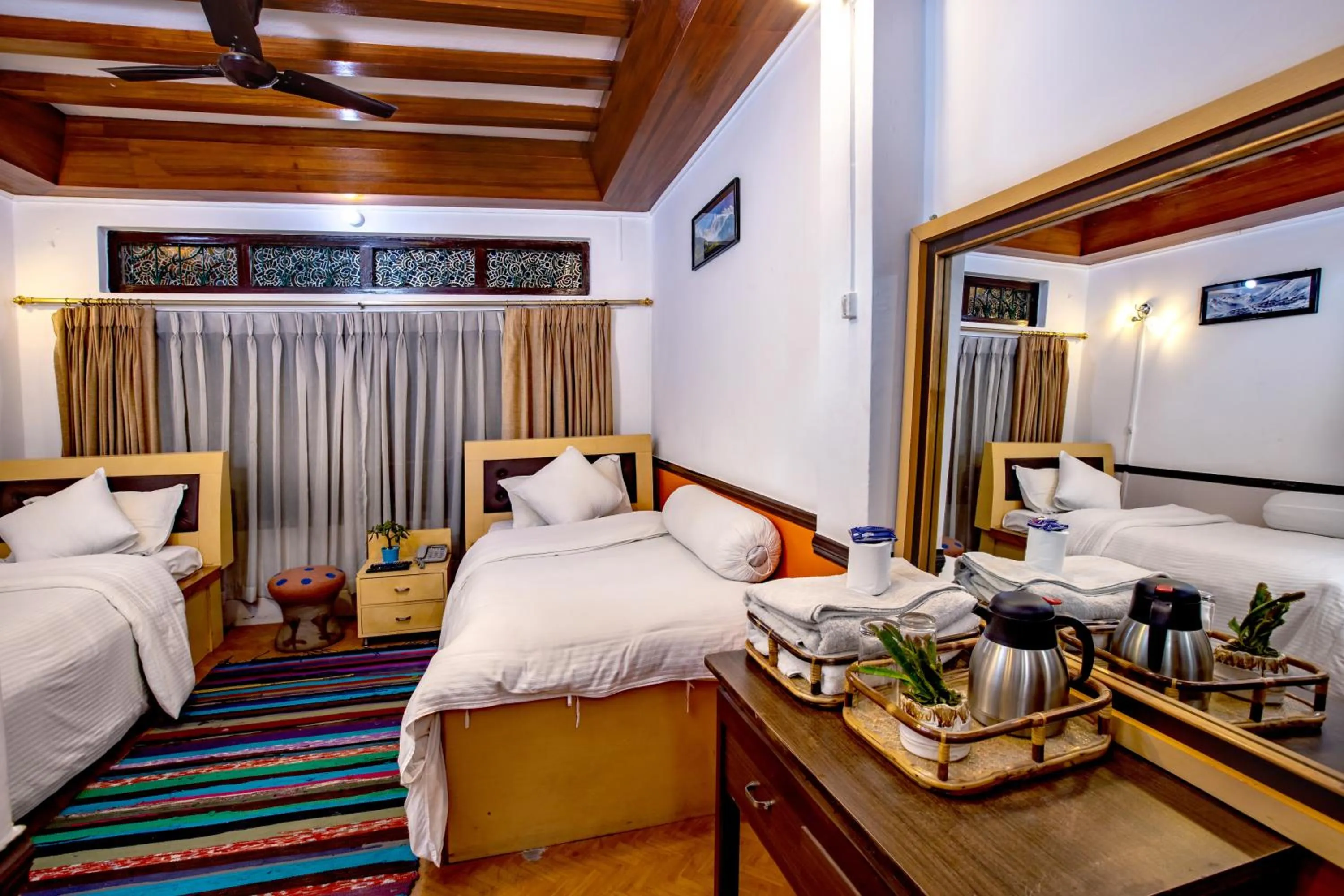 Bed in Shangrila Boutique Hotel