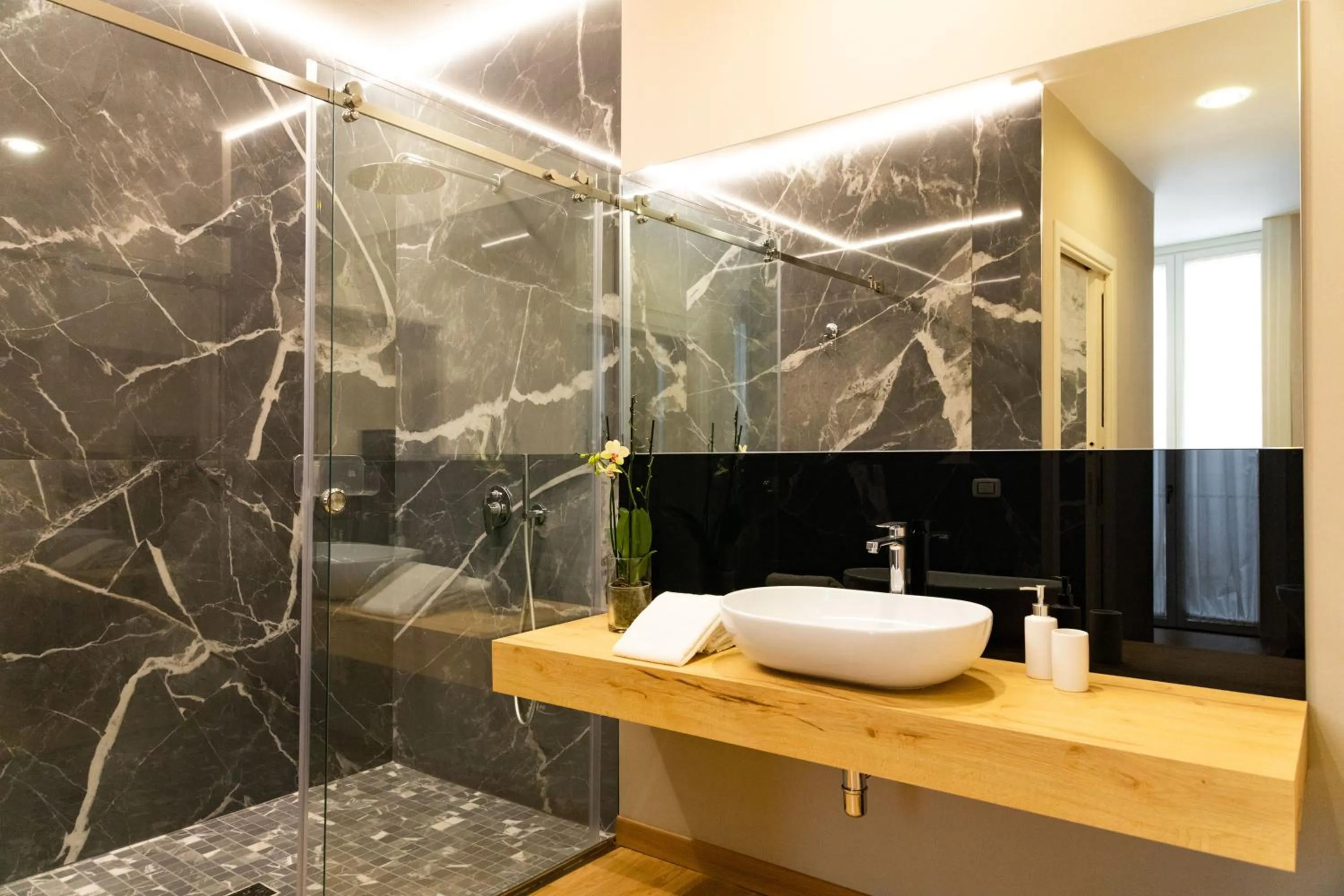 Bathroom in Divisi Suites & SPA