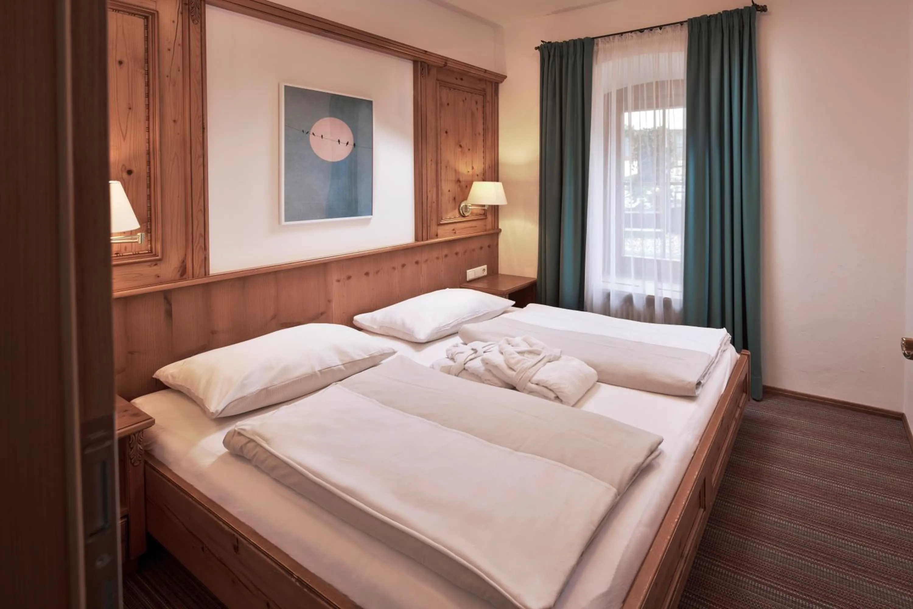 Bedroom, Bed in Romantikhotel Zell am See