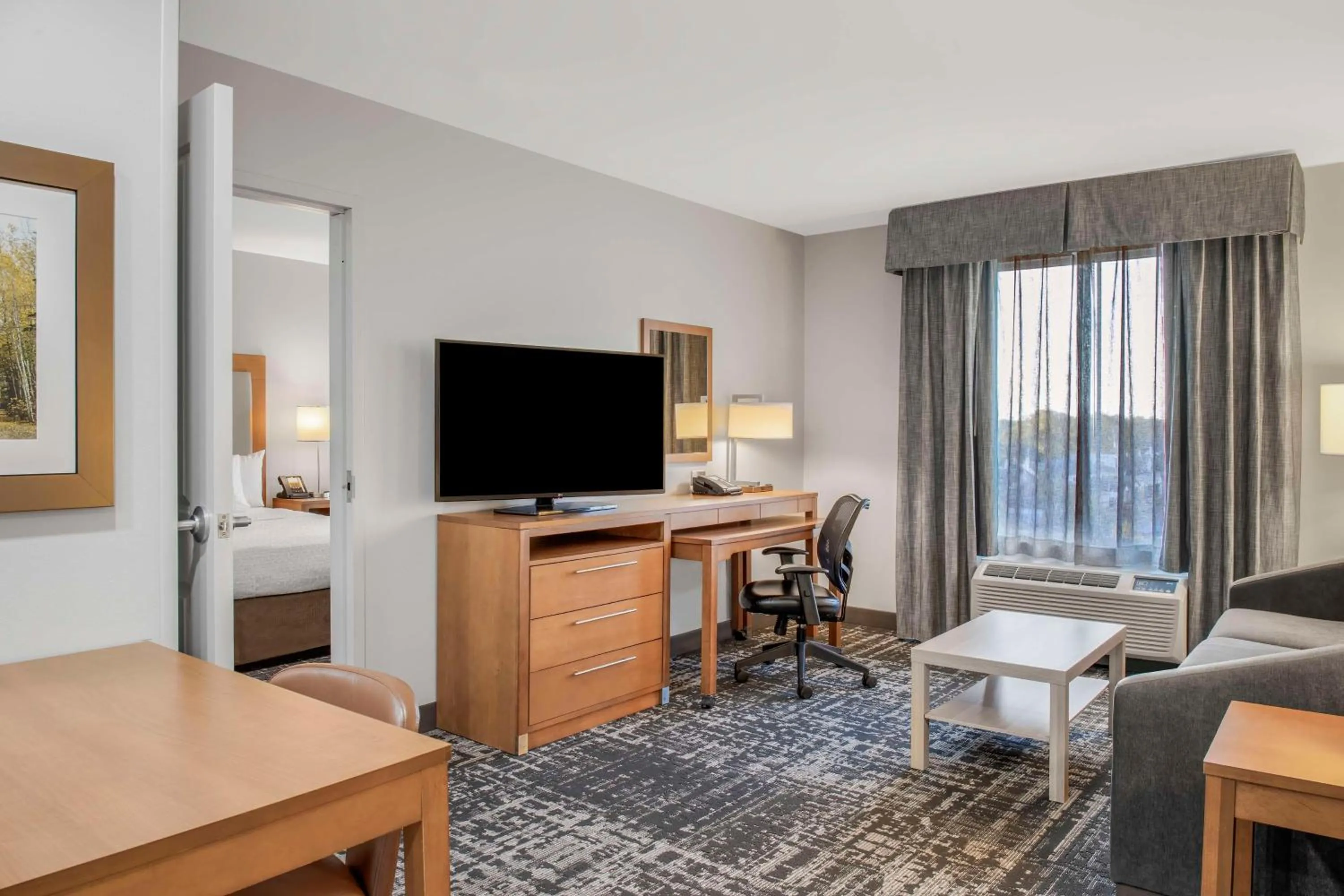Living room in Homewood Suites by Hilton Winnipeg Airport - Polo Park