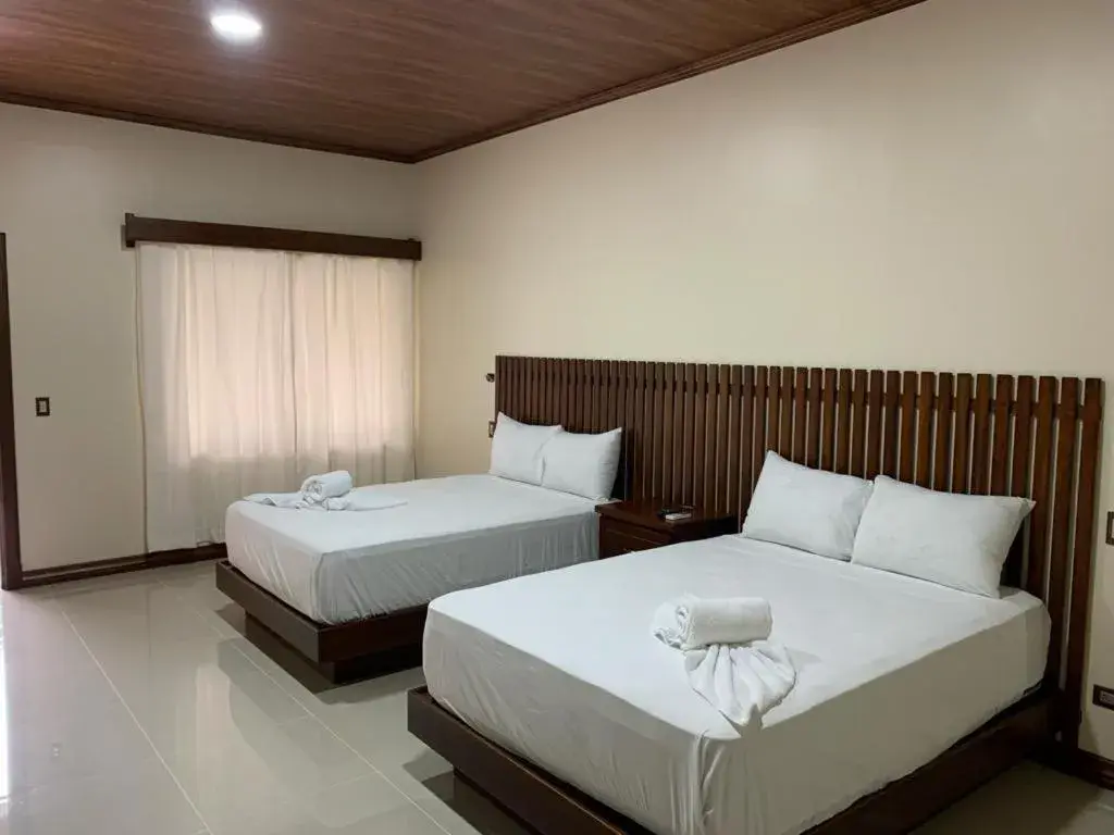 Photo of the whole room, Bed in Orquideas Boutique Hotel Photo of the whole room, Bed in Orquideas Boutique Hotel