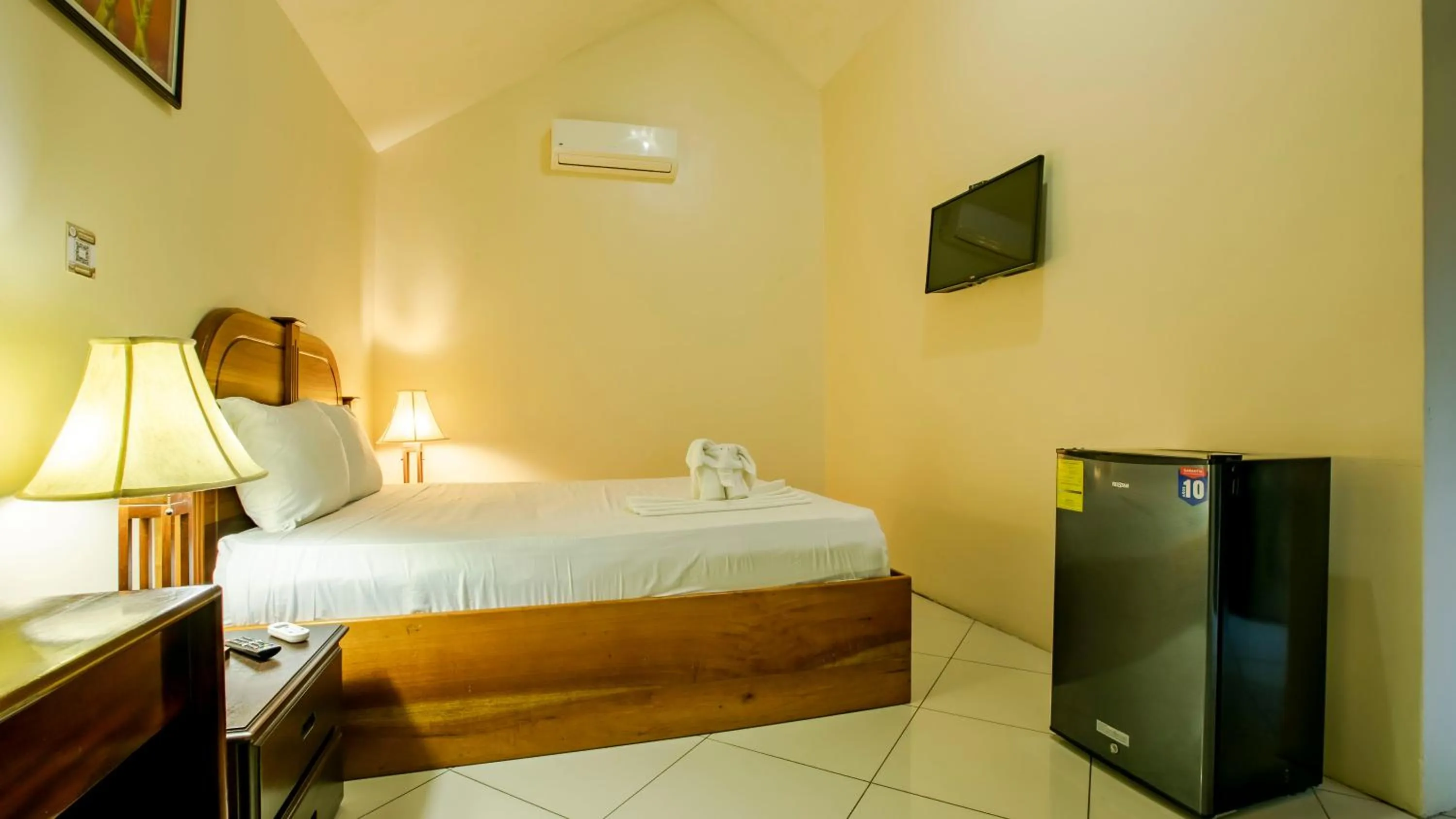 Bed in Orquideas Boutique Hotel