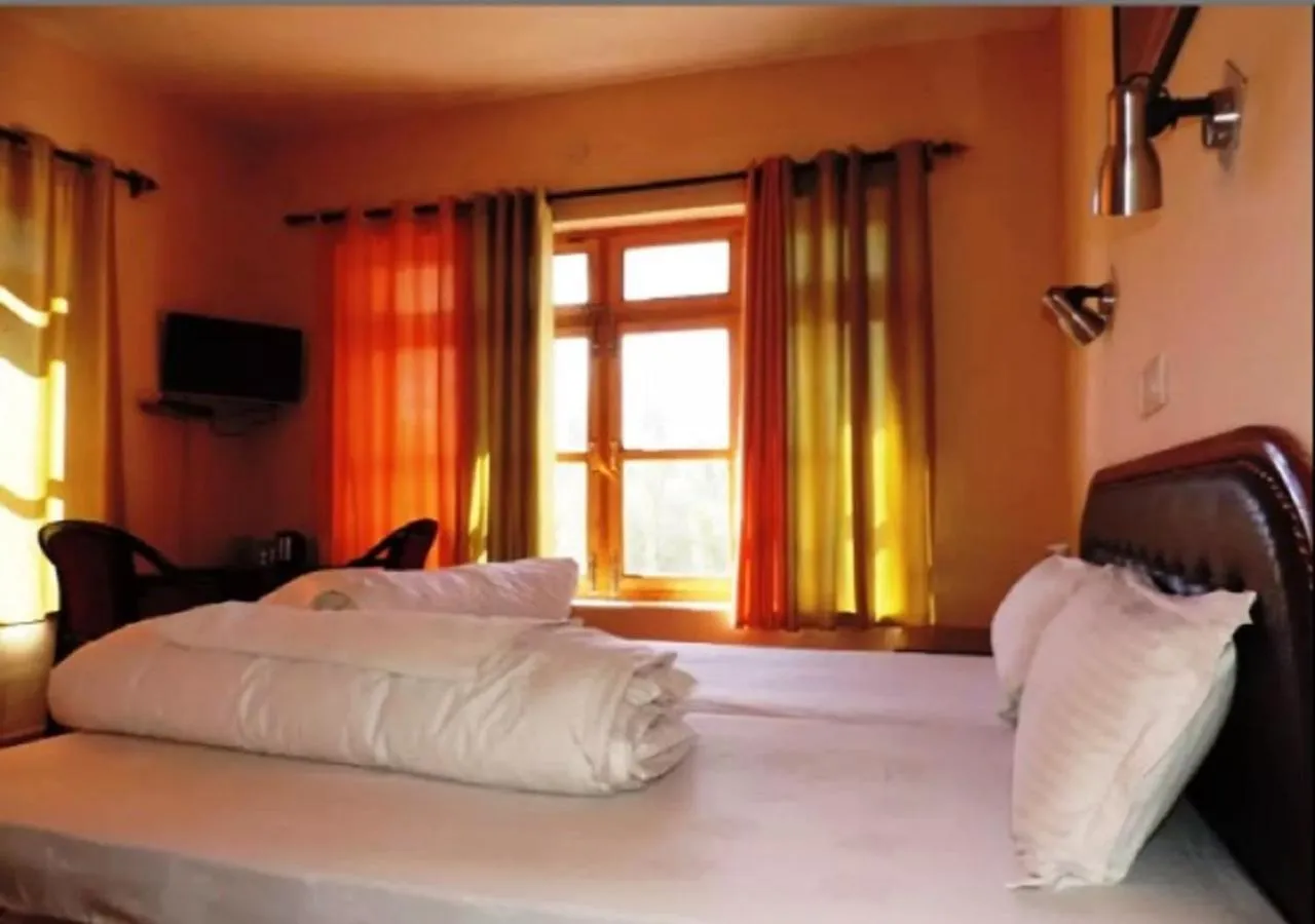 Bed in Hotel Ladakh Heaven
