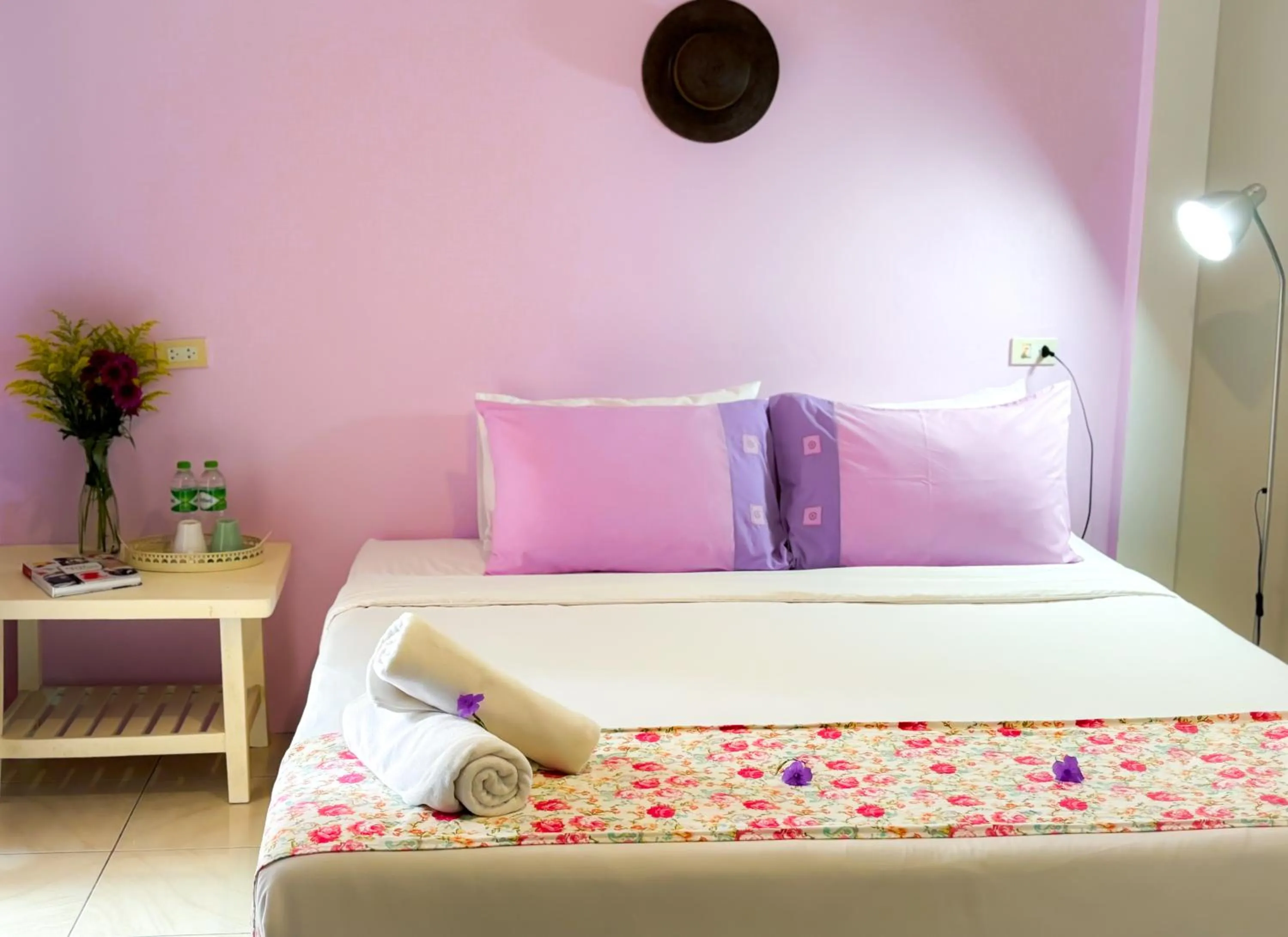 Bed in Les Fleurs House