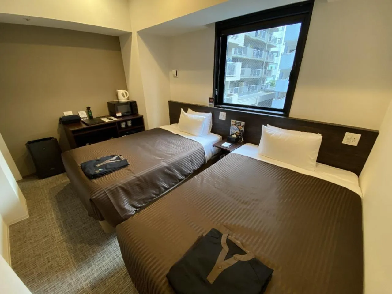 Bed in HOTEL LiVEMAX PREMIUM Nagoya Marunouchi