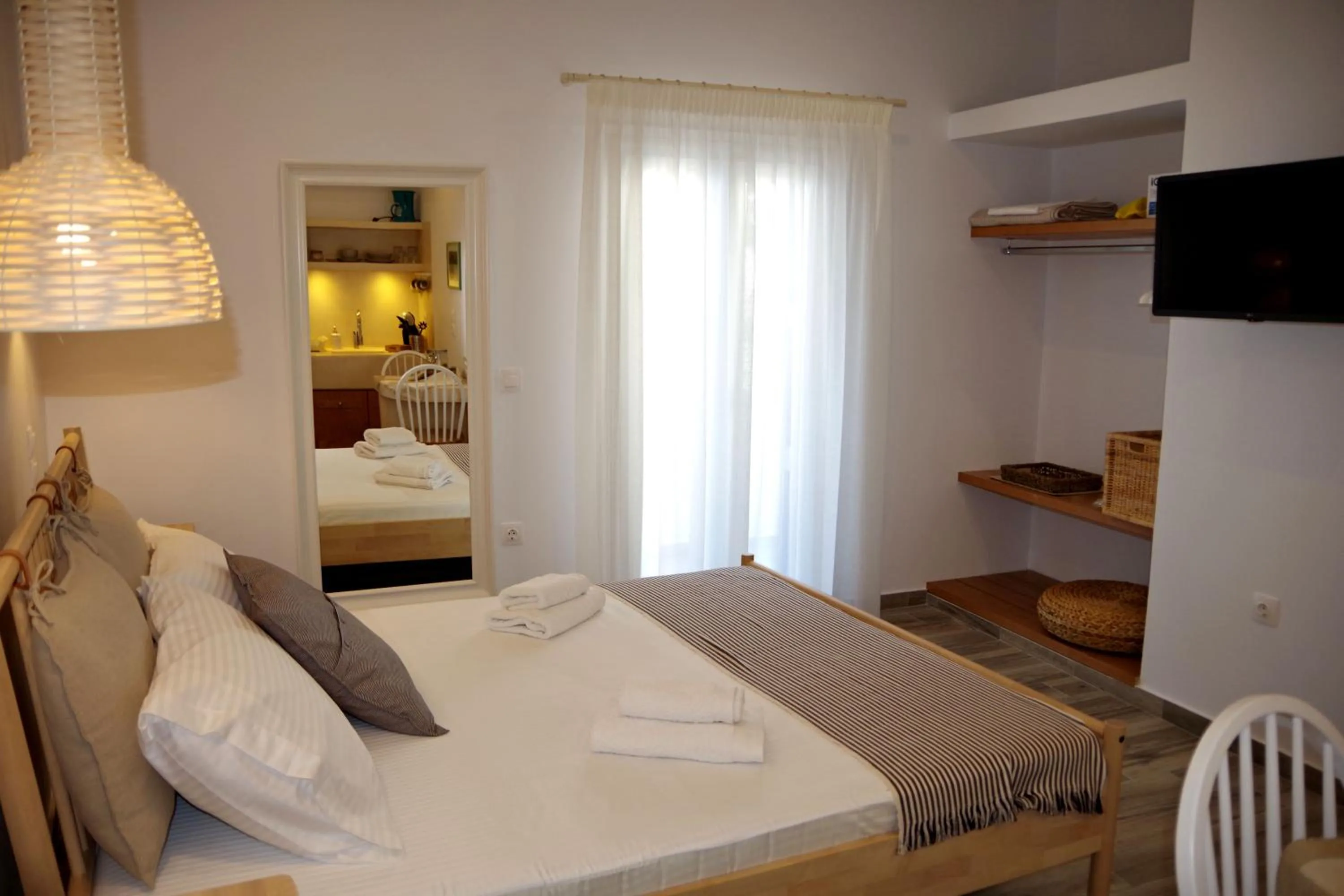 Bed in Xenios Zeus Apartments