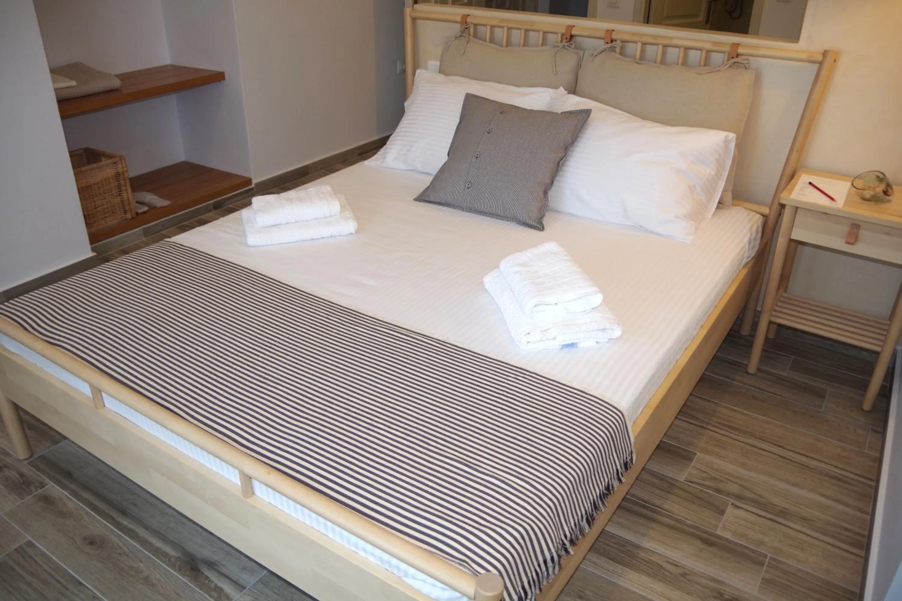Bed in Xenios Zeus Apartments