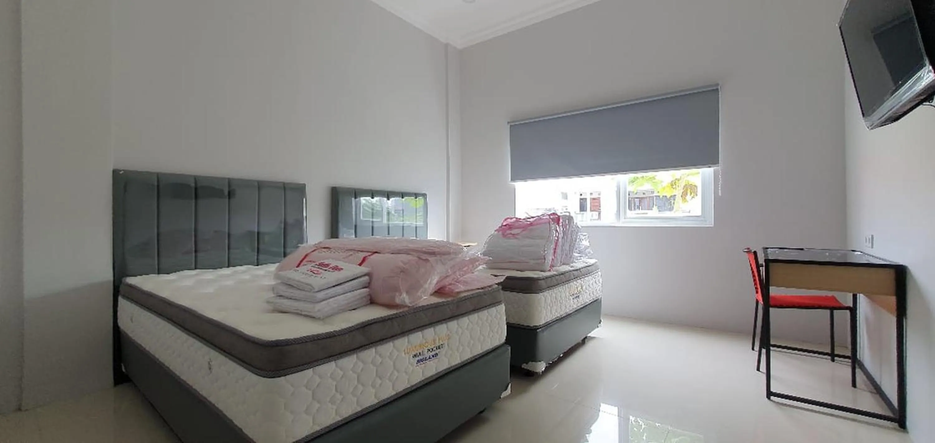 Bed in RedDoorz Plus near Siloam Hospital Balikpapan