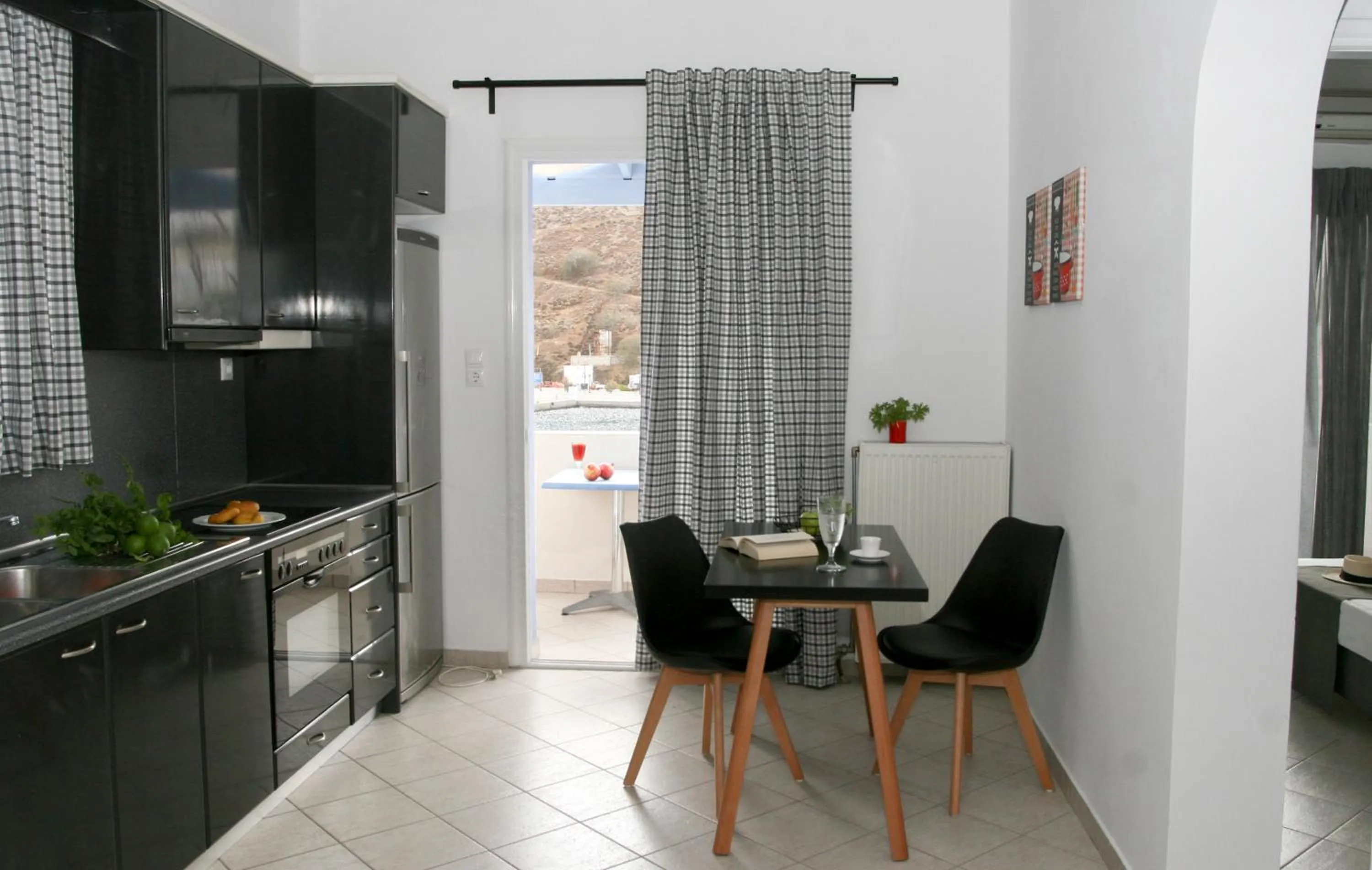 Kitchen or kitchenette in Vithos Seaside Aparthotel
