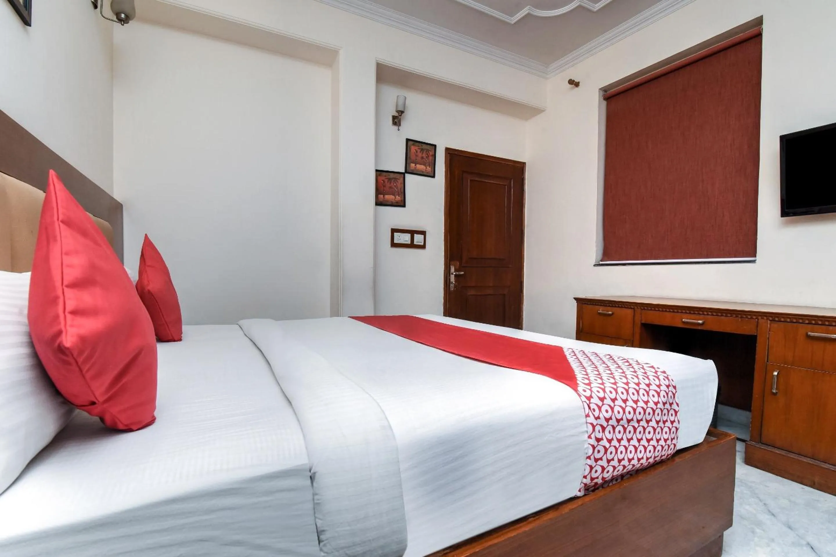 Bedroom in Capital O Corporate Inn