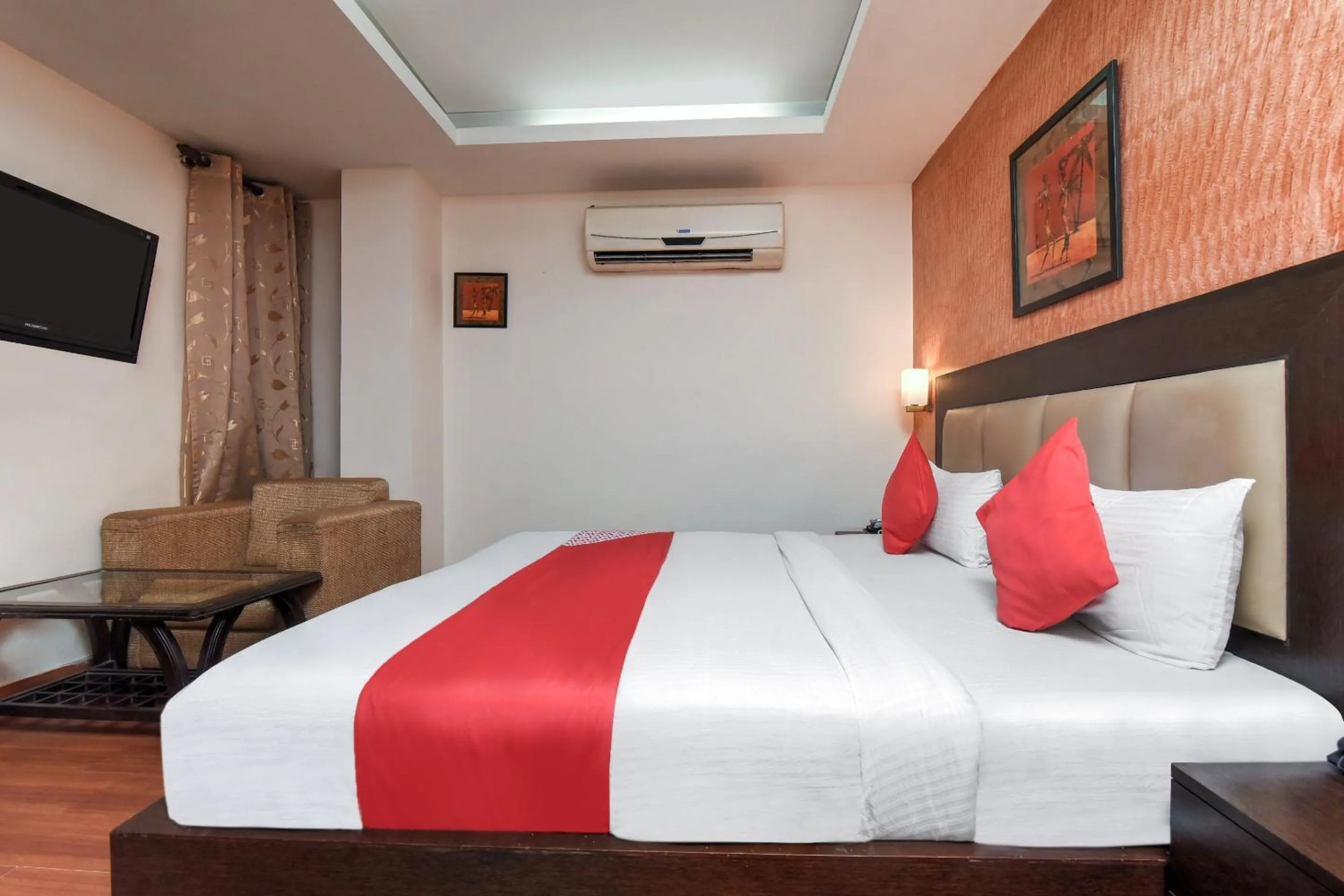 Bedroom in Capital O Corporate Inn