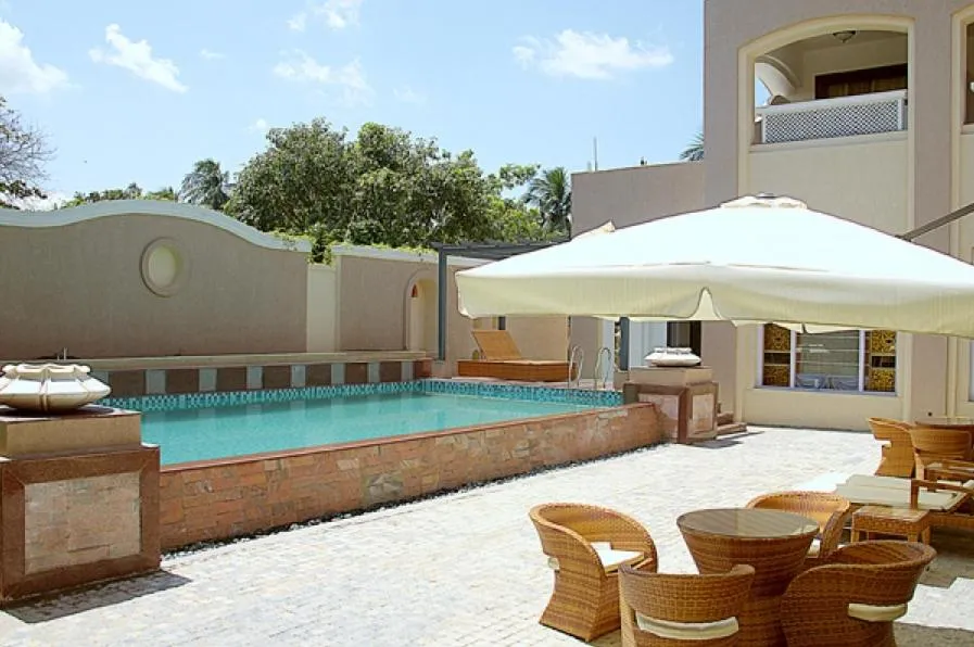 Swimming pool in Pramod Convention & Club Resort