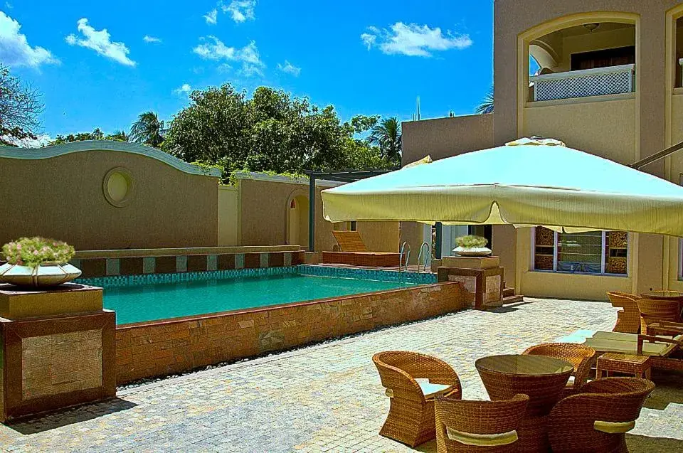 Swimming pool in Pramod Convention & Club Resort Swimming pool in Pramod Convention & Club Resort