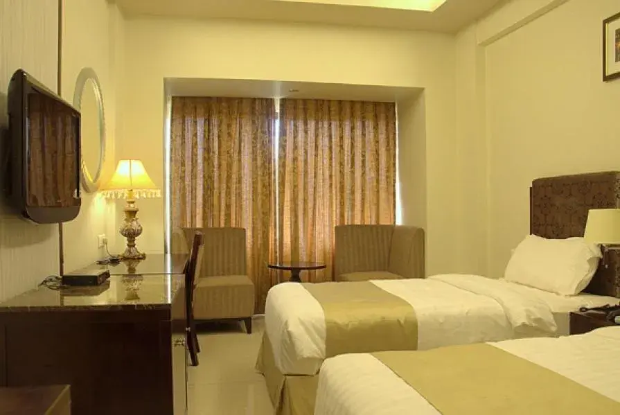 Bedroom, Bed in Pramod Convention & Club Resort Bedroom, Bed in Pramod Convention & Club Resort