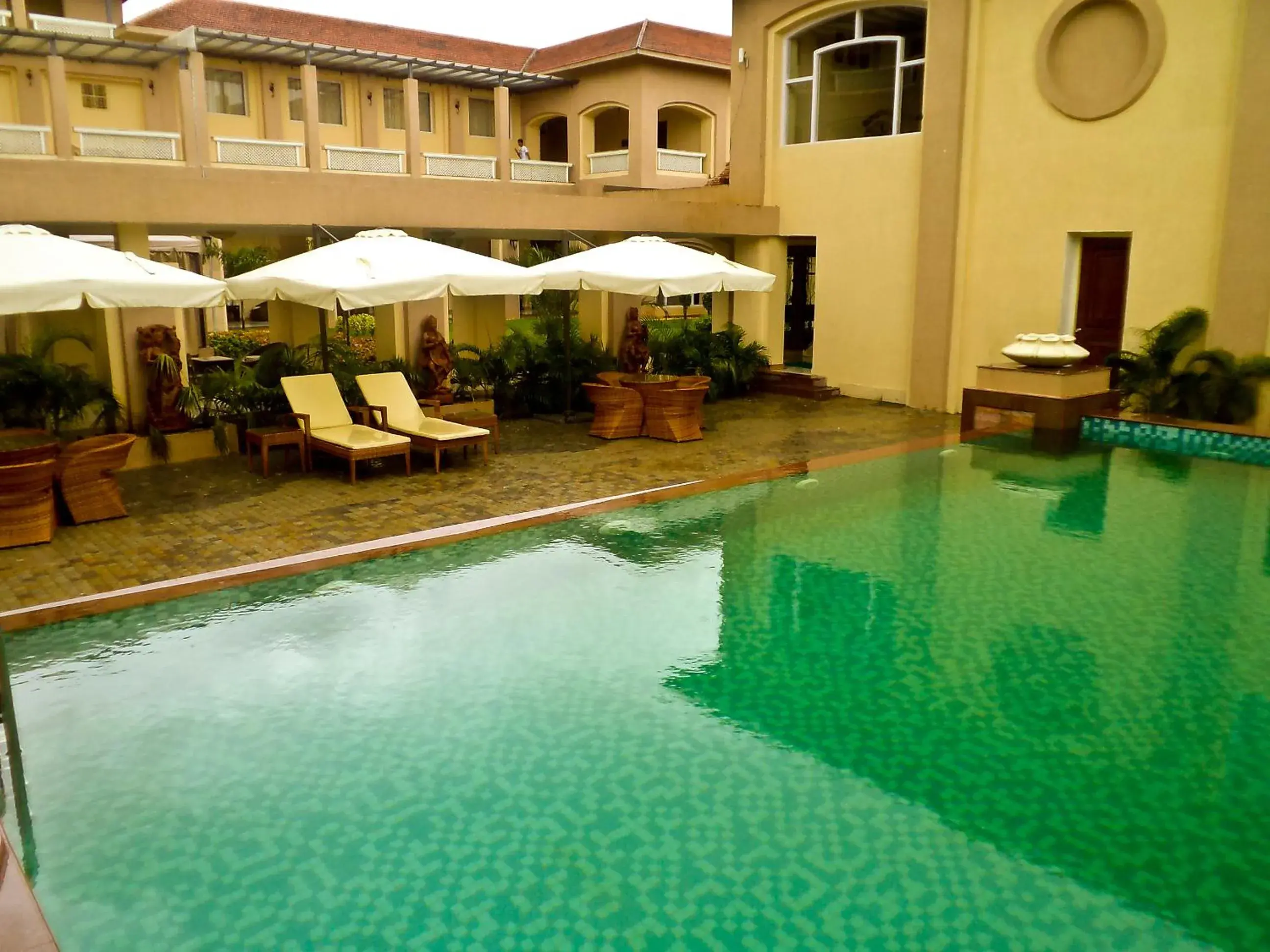 Swimming pool in Pramod Convention & Club Resort Swimming pool in Pramod Convention & Club Resort