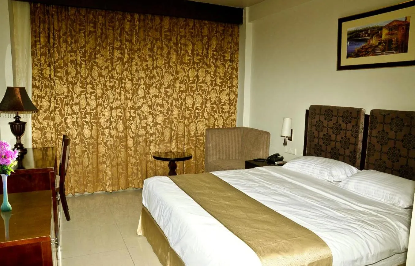 Bedroom, Bed in Pramod Convention & Club Resort