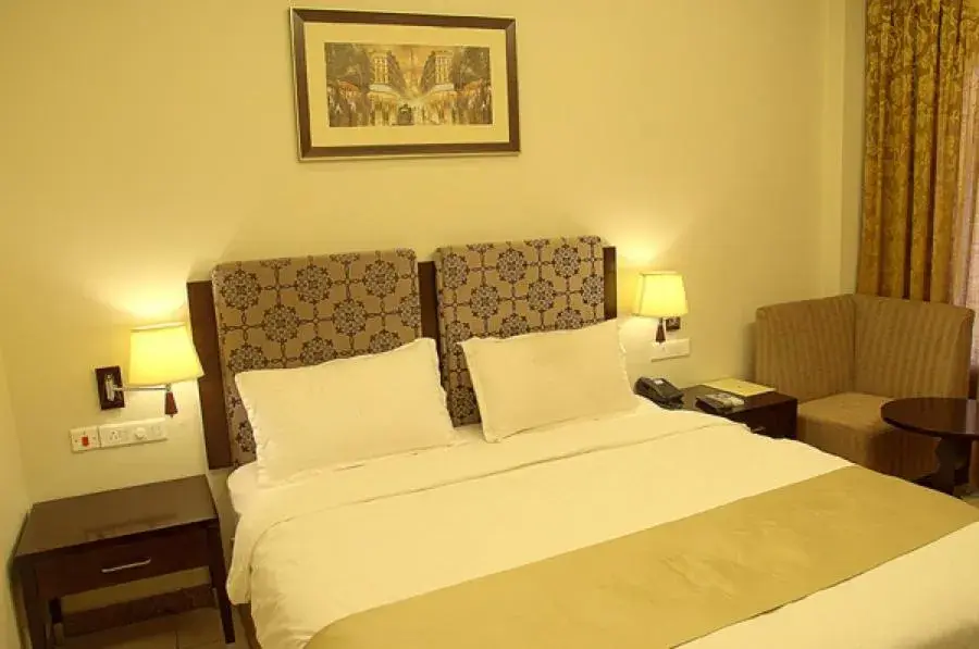 Bed in Pramod Convention & Club Resort Bed in Pramod Convention & Club Resort