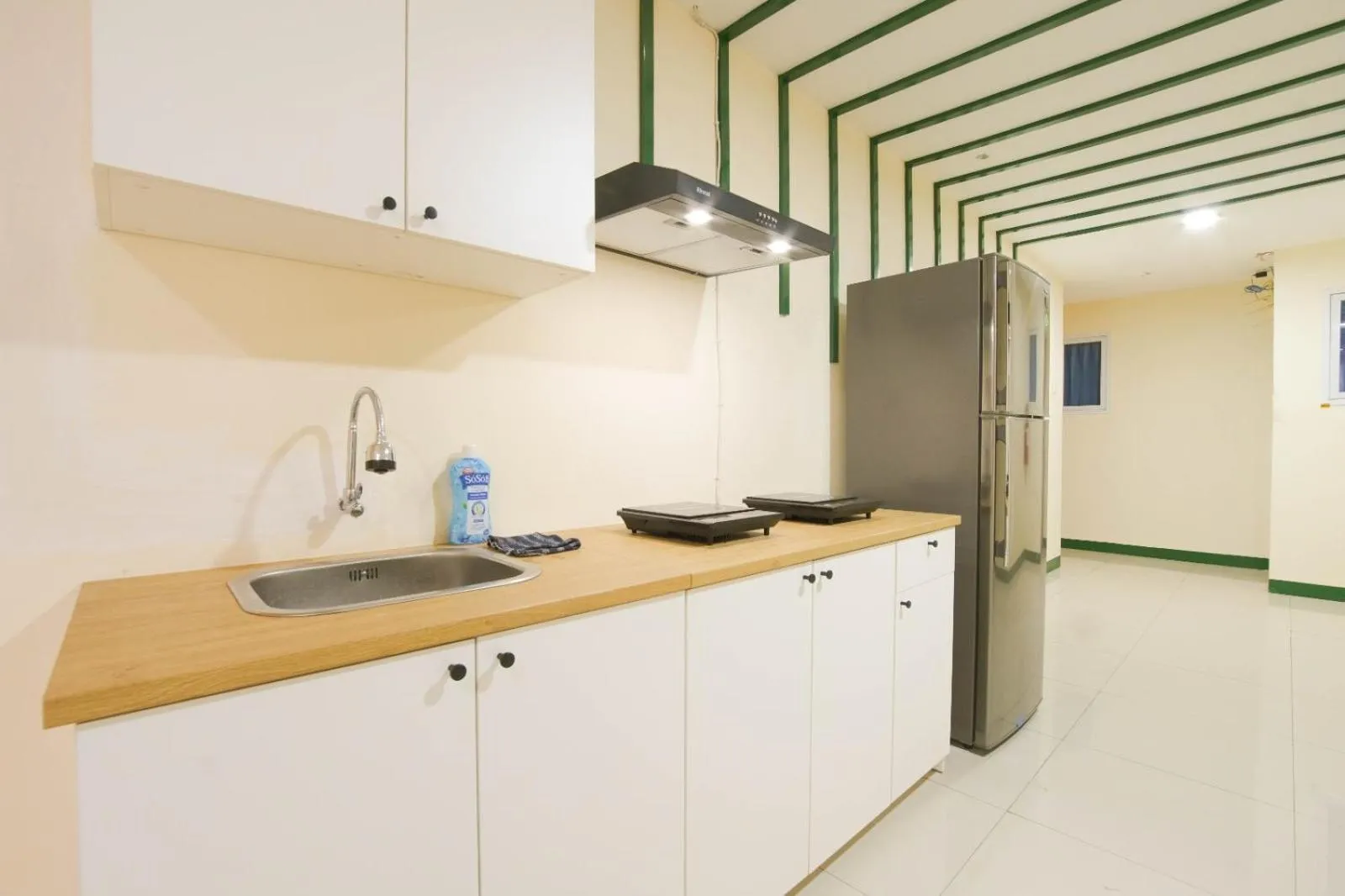 Kitchen or kitchenette in Le Paris Syariah Residence