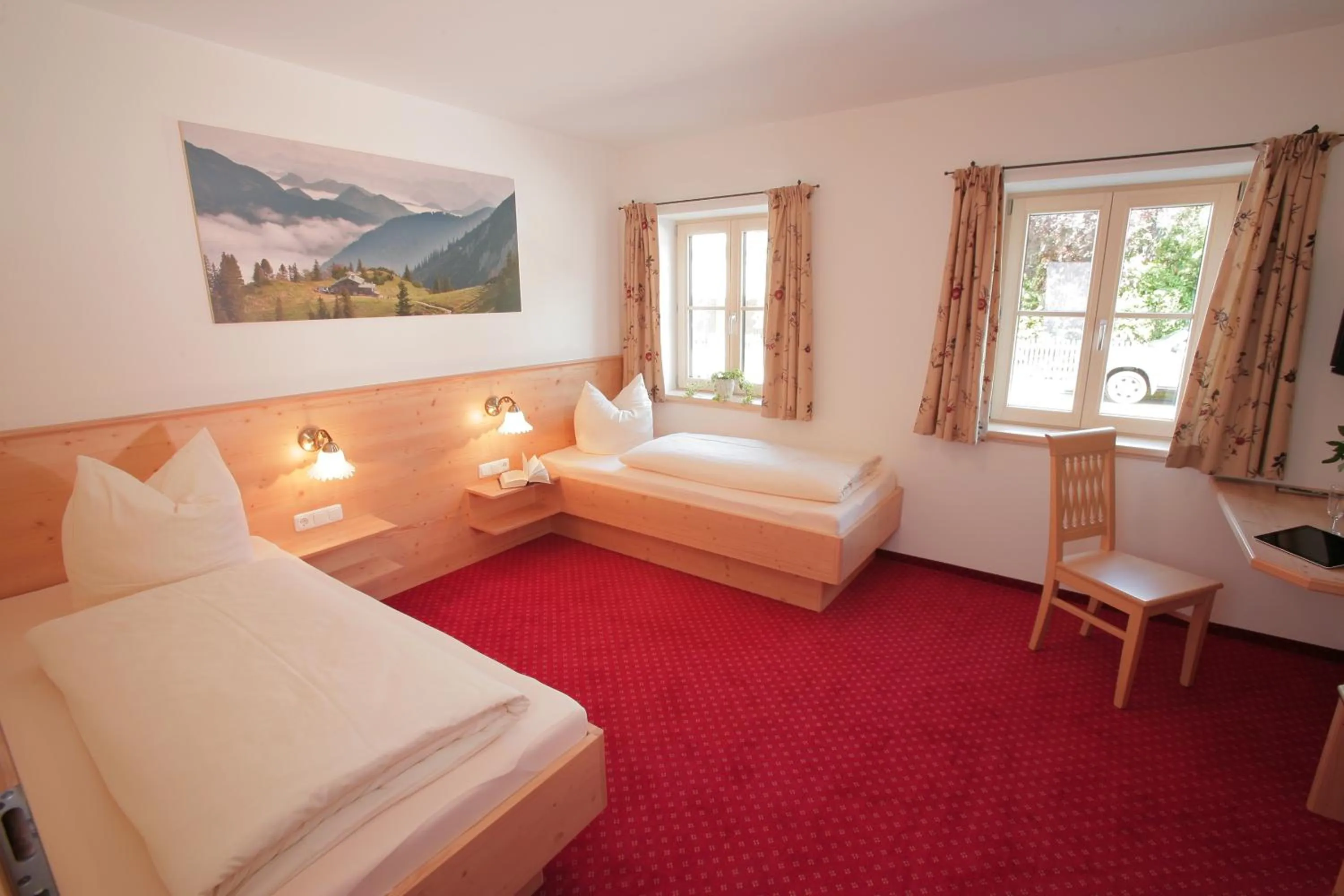 Photo of the whole room, Bed in Pension Schweizerhaus Garni