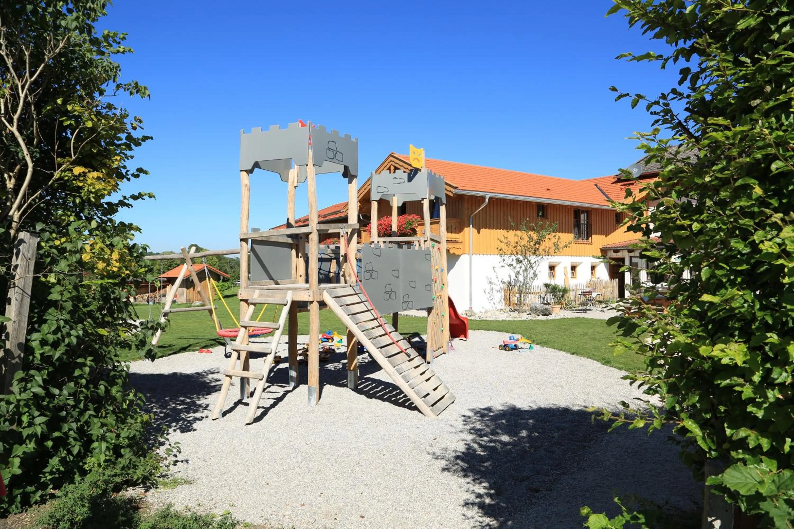 Children play ground in Pension Schweizerhaus Garni