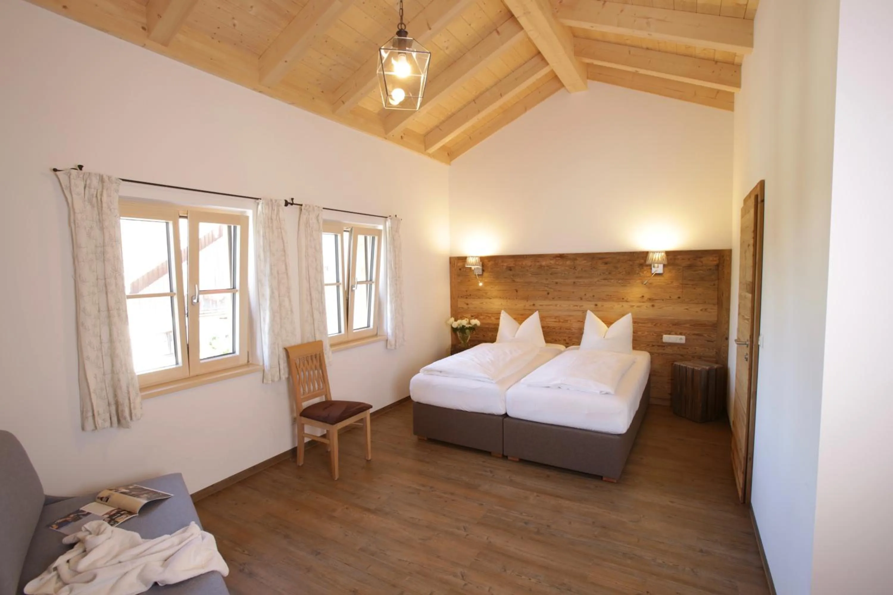Photo of the whole room, Bed in Pension Schweizerhaus Garni