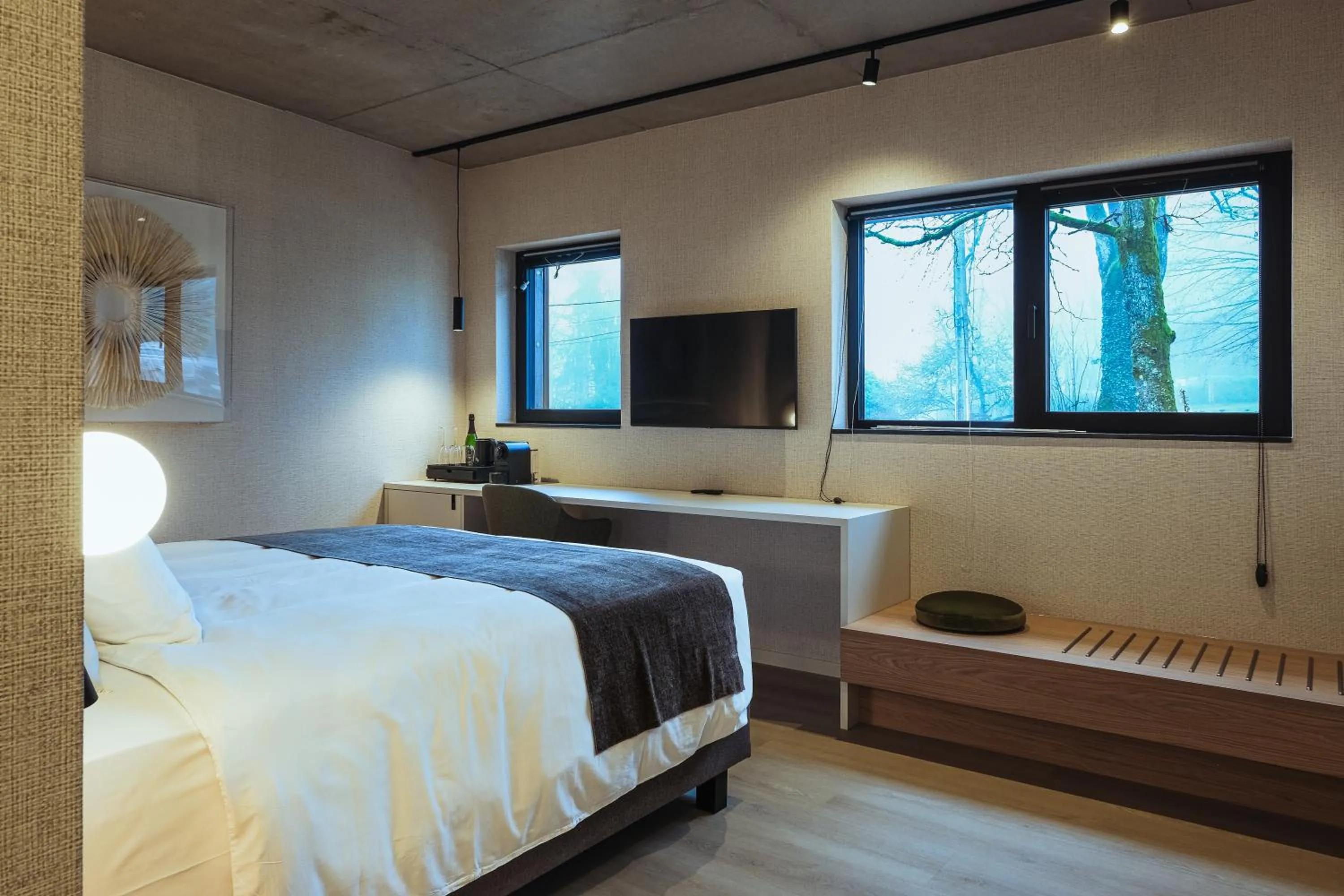 Bed in Hôtel Les Ardillières du Pont d'Oye