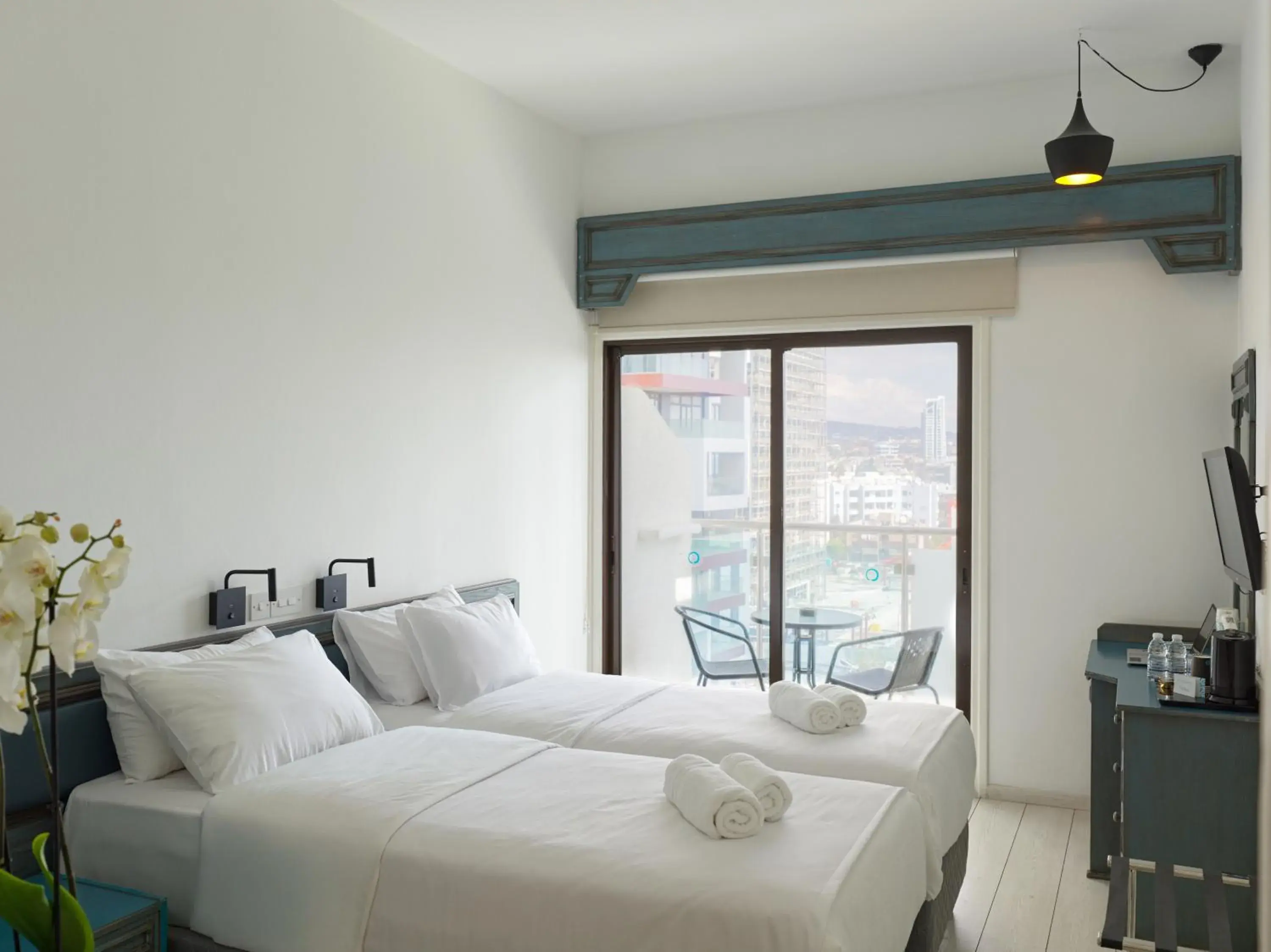 Twin Room with Pool View in TSANotel Twin Room with Pool View in TSANotel