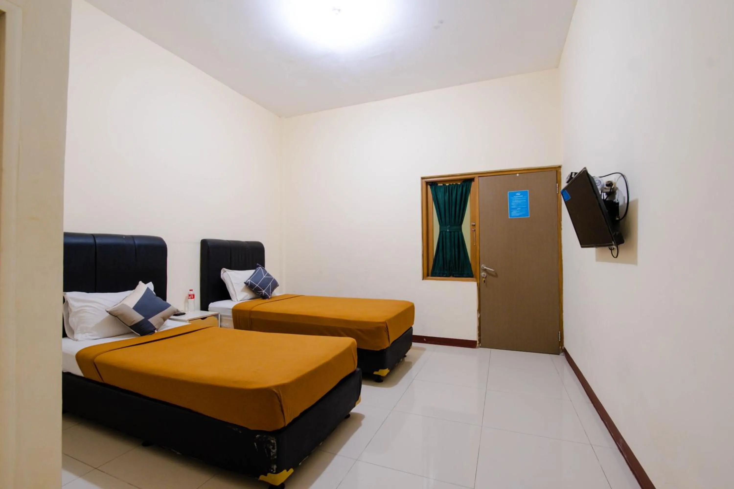 Bed in Athena Syariah Residence